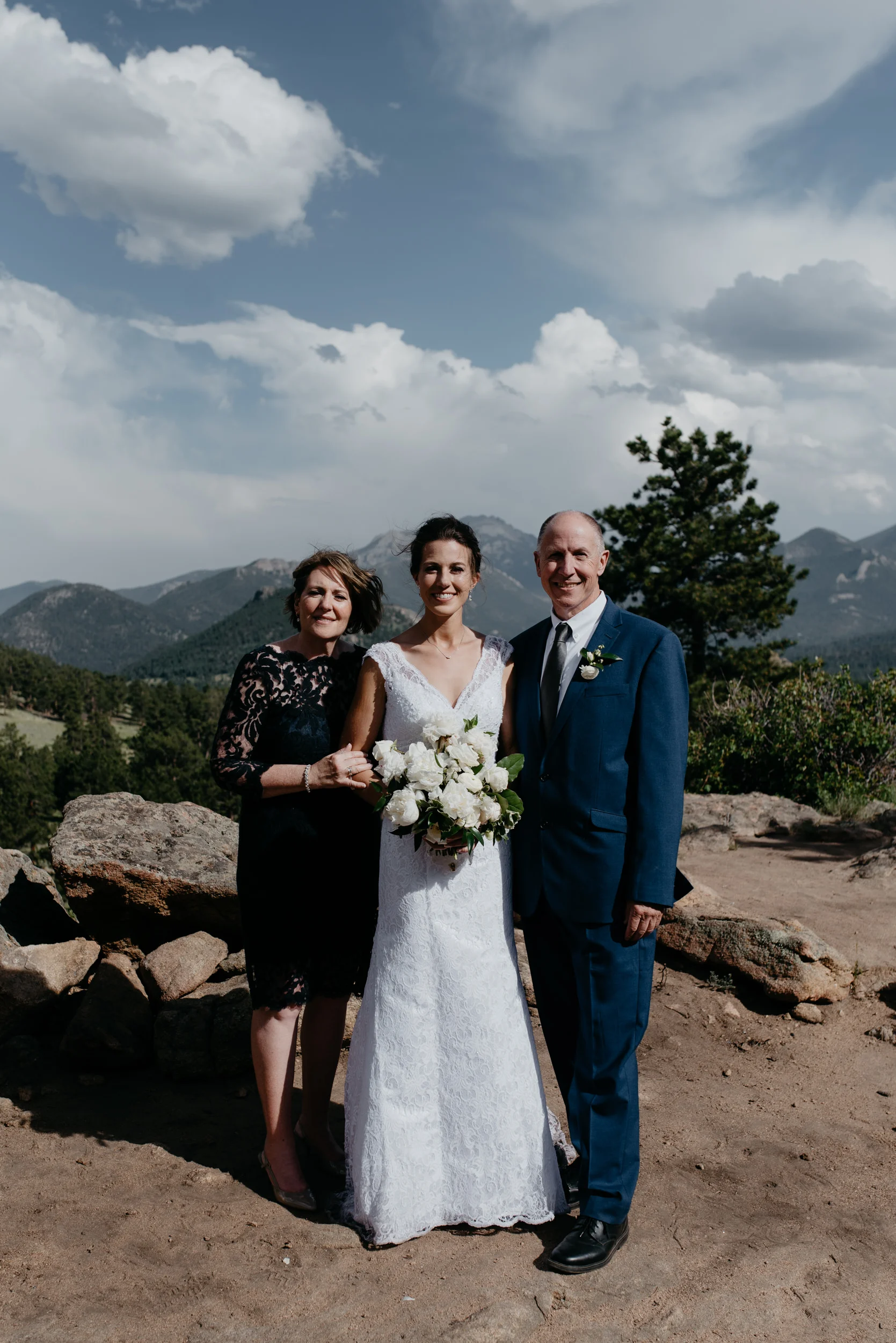  Family photos at Rocky Mountain National Park elopement. Wedding ceremony at 3M curve in Colorado. 