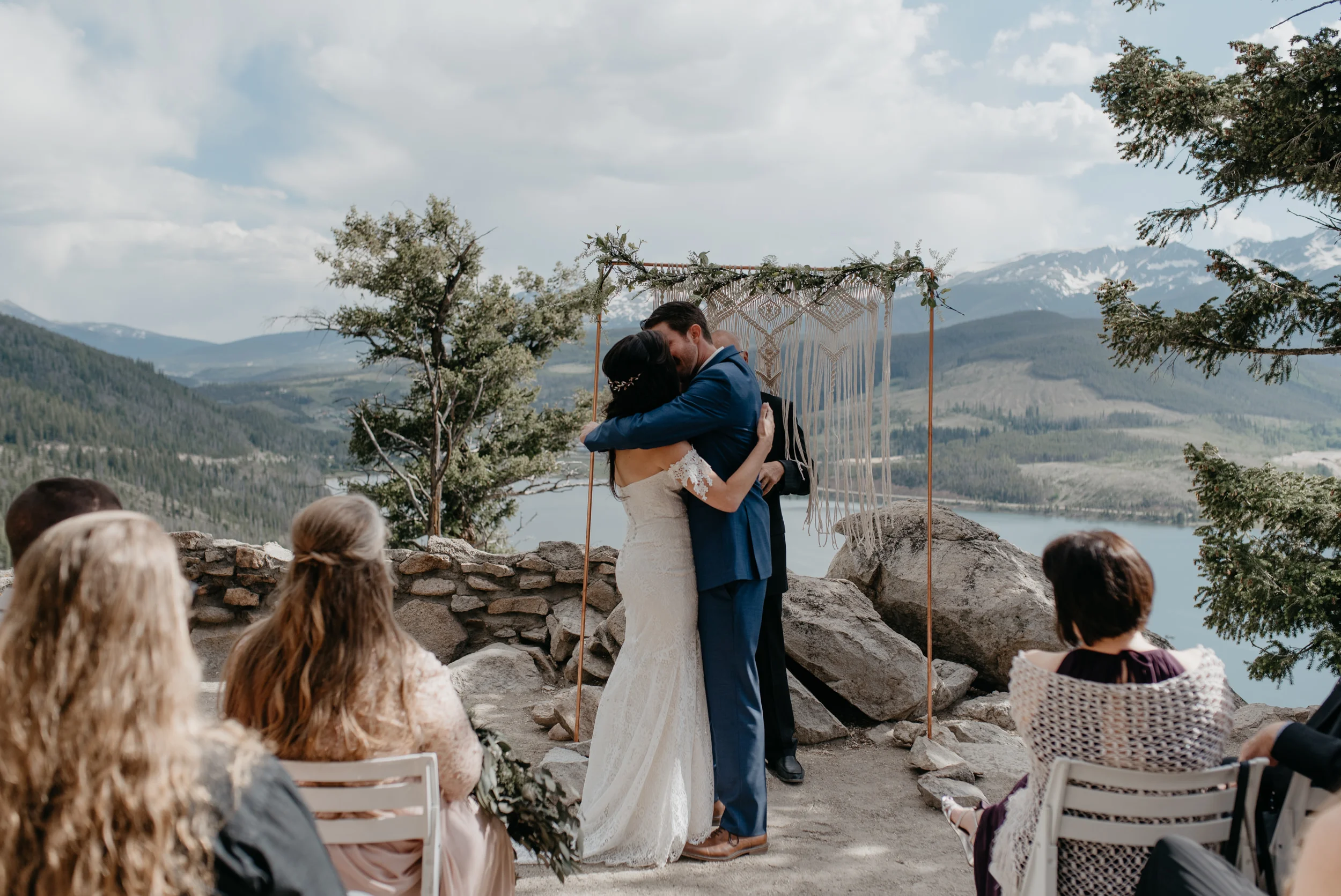  First Kiss at wedding in Colorado. Sapphire Point wedding photographer. 