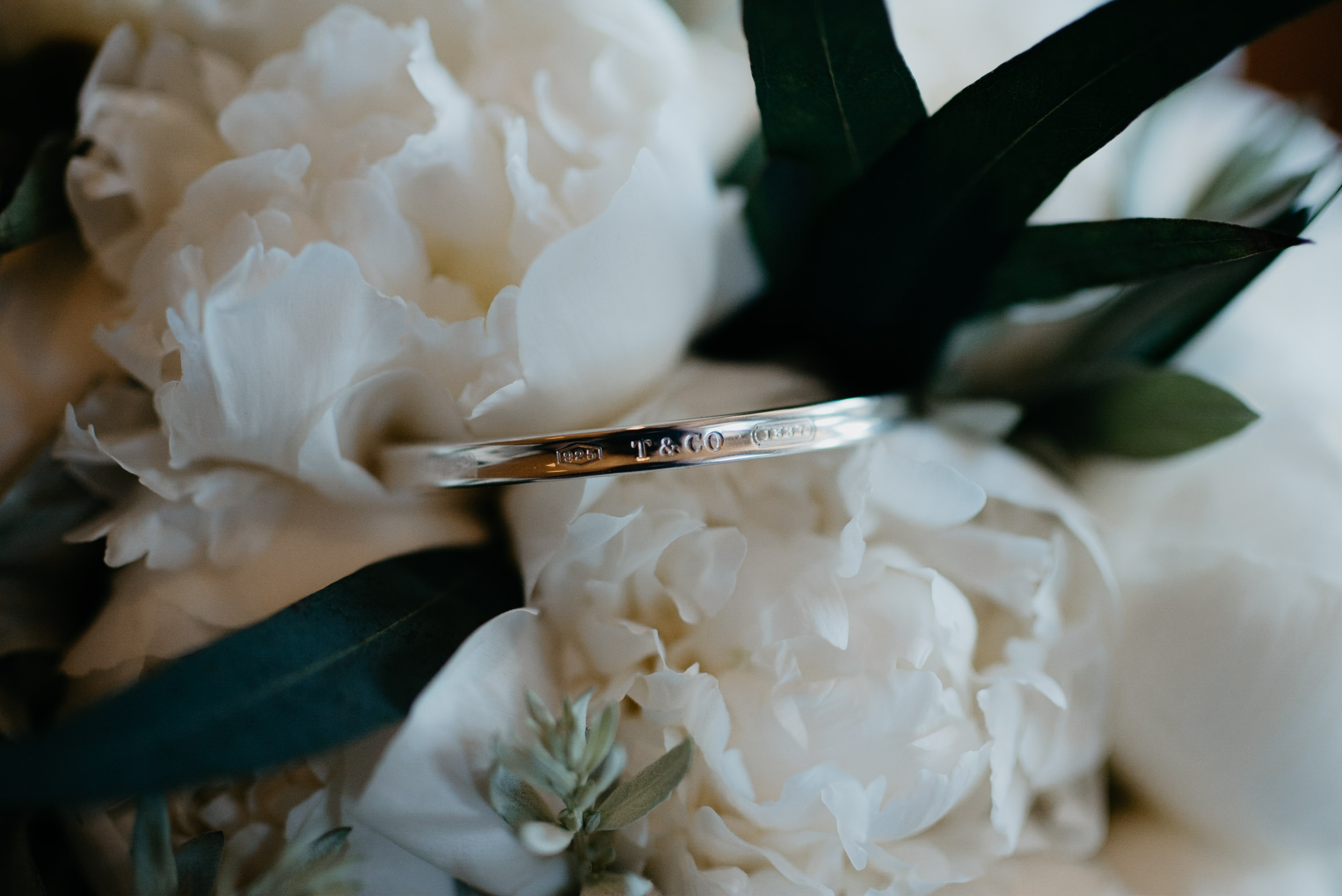  Brides Tiffany & Co bracelet. Wedding at The Little Nell in Aspen, CO. Aspen wedding photographer. 