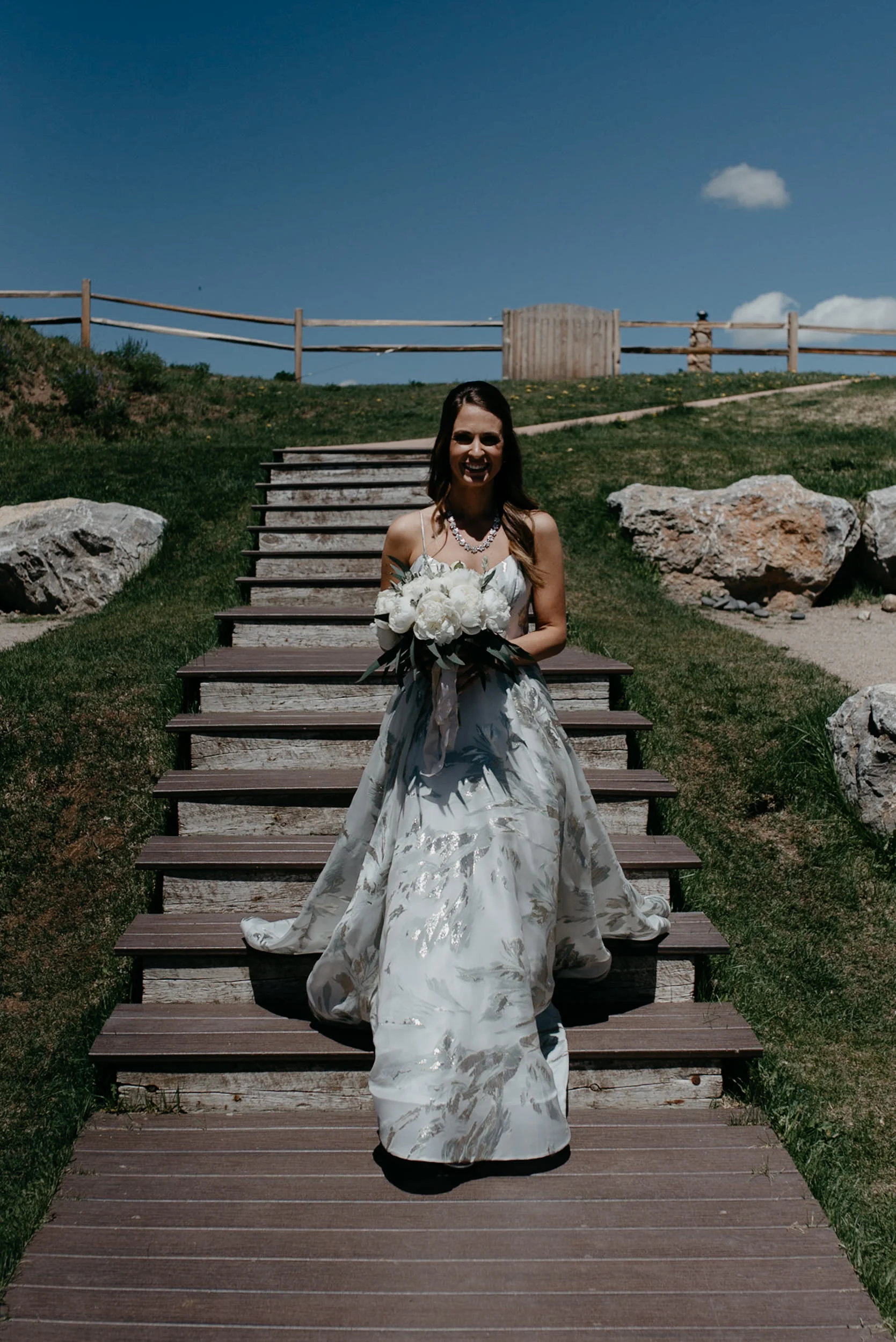  Bride walking down isle at The Little Nell. Aspen, Colorado elopement and wedding photographer. 