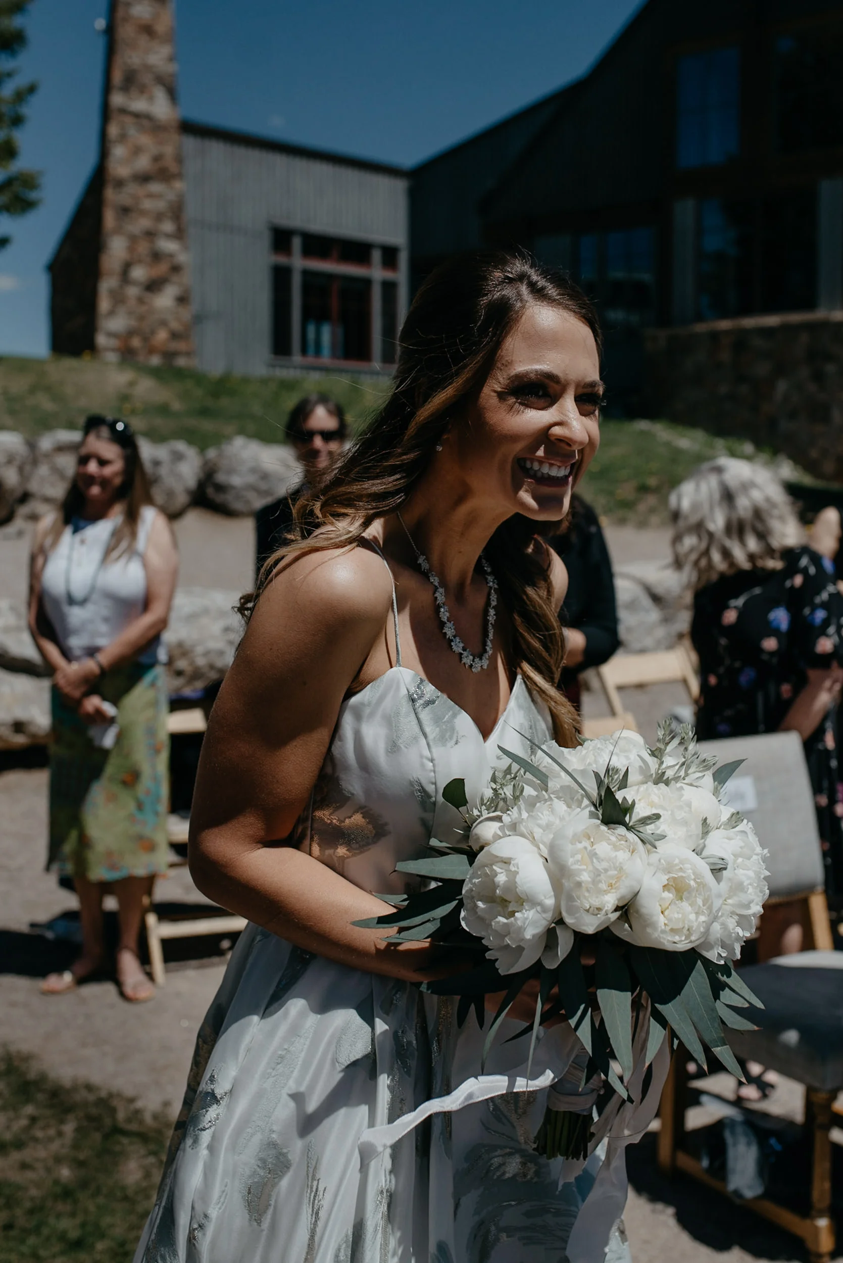  The Little Nell wedding ceremony. Bride walking down isle. 