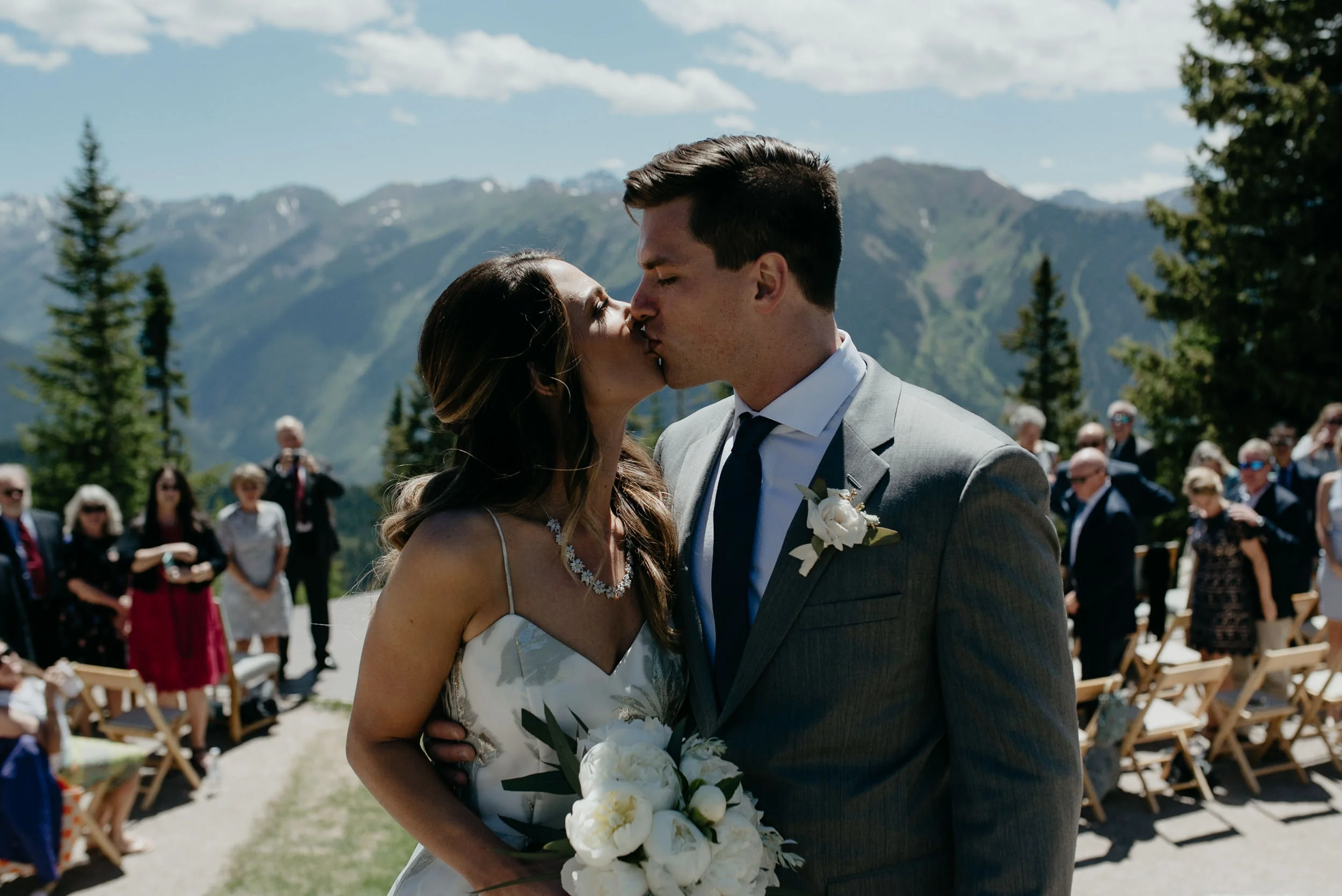  Bride and groom kiss at The Little Nell. Colorado wedding and elopement photographer. 