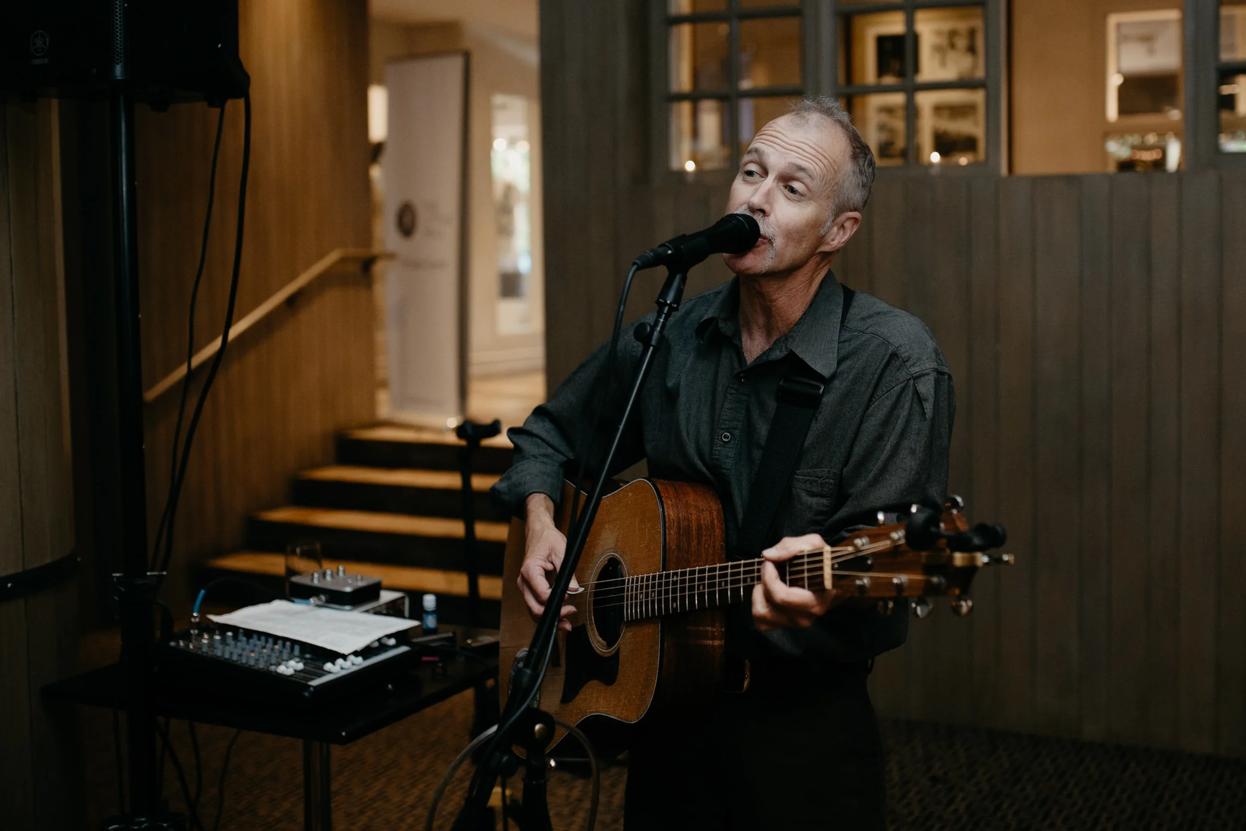  Aspen, Colorado wedding photographer. Band playing at a wedding at The Little Nell. 