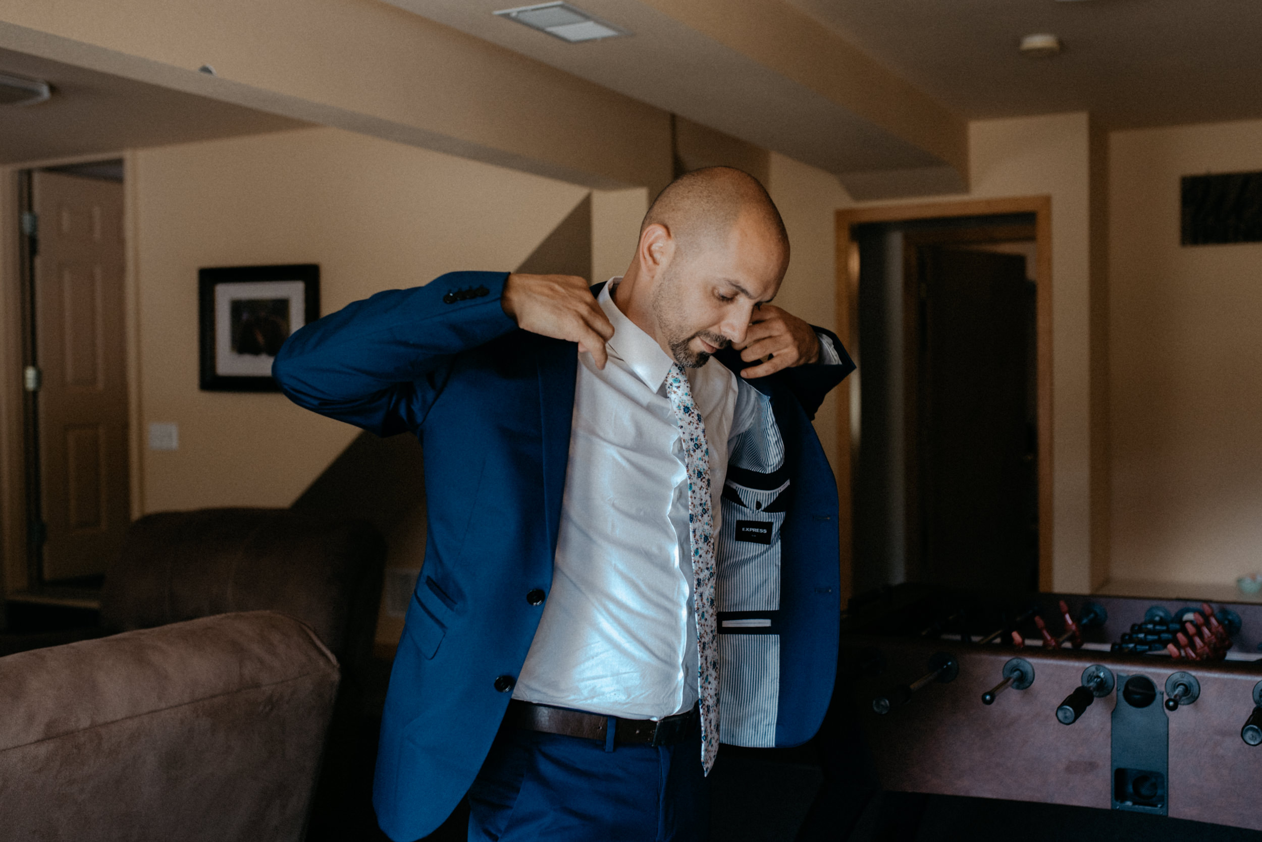  Groom getting ready. Colorado elopement and wedding photographer. 