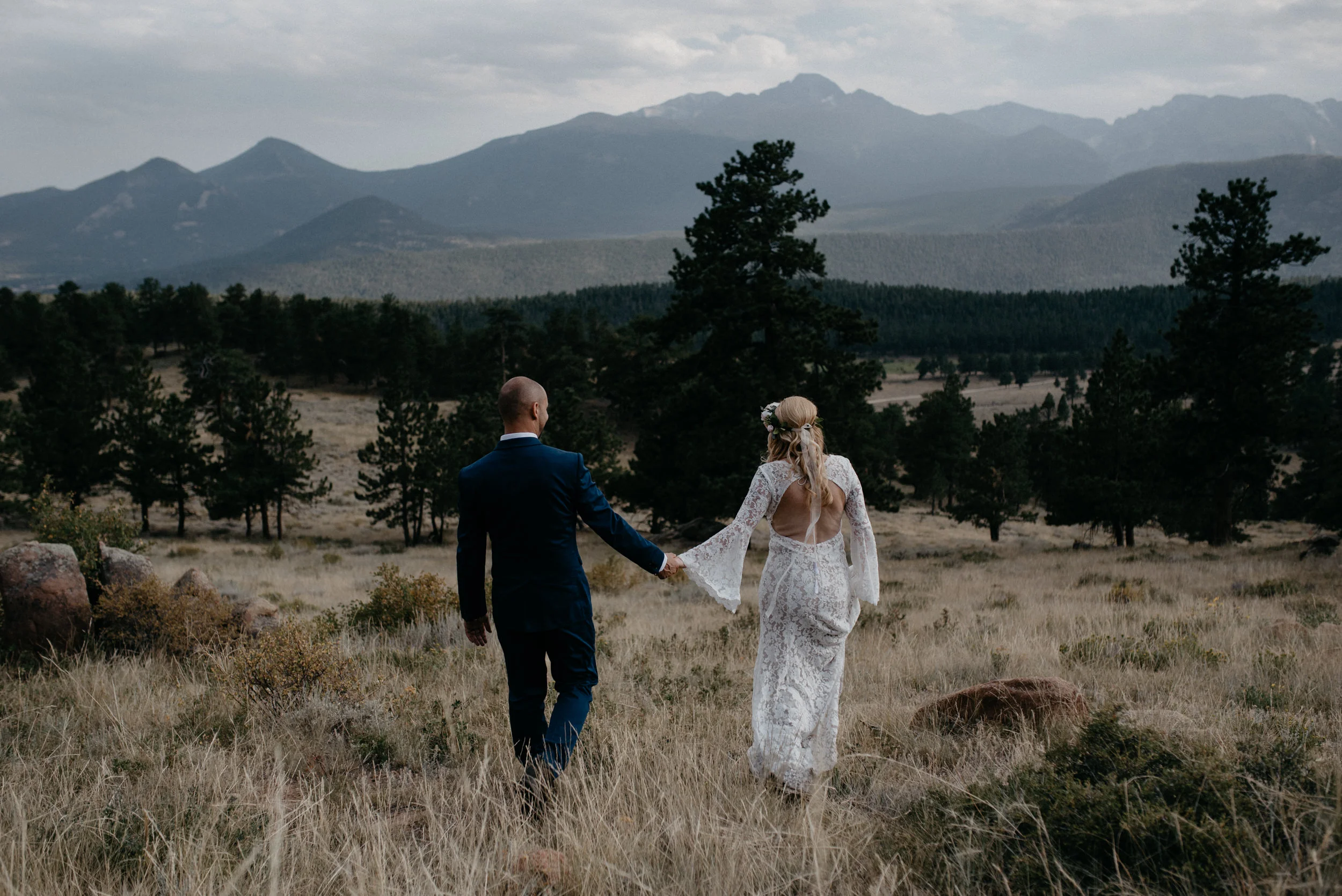  Bride and groom portraits at an elopement in Rocky Mountain National Park at 3M curve. 