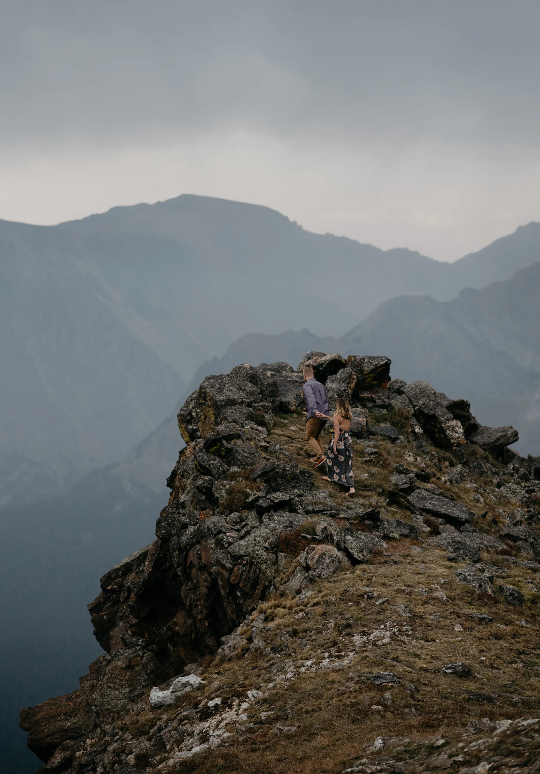  Adventure engagement session in Rocky Mountain National Park. Mountaintop elopement in Colorado. Denver wedding and elopement photographer. 