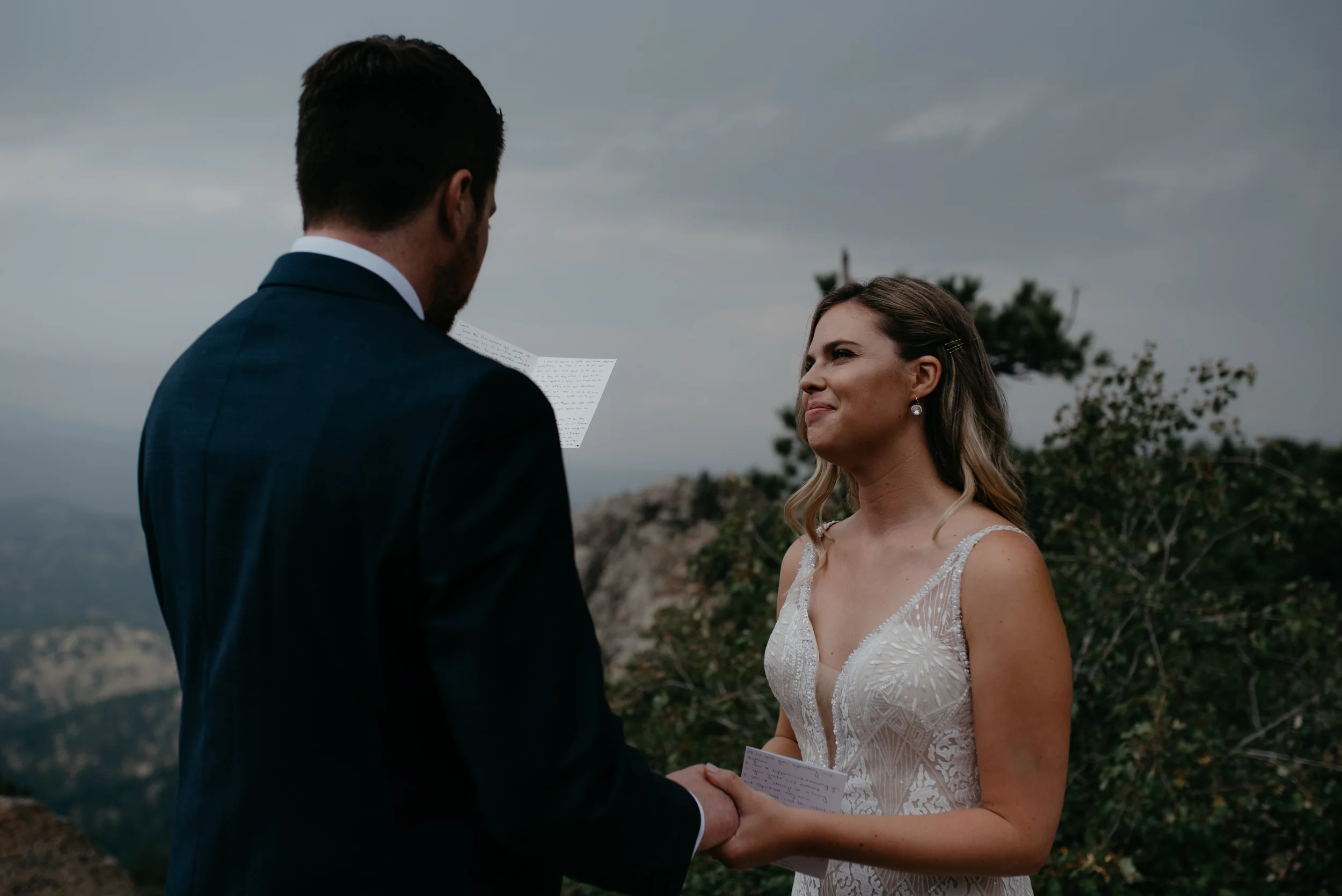  Colorado elopement and wedding photographer. Bride and groom exchanging vows in Boulder, Colorado at Lost Gulch. 