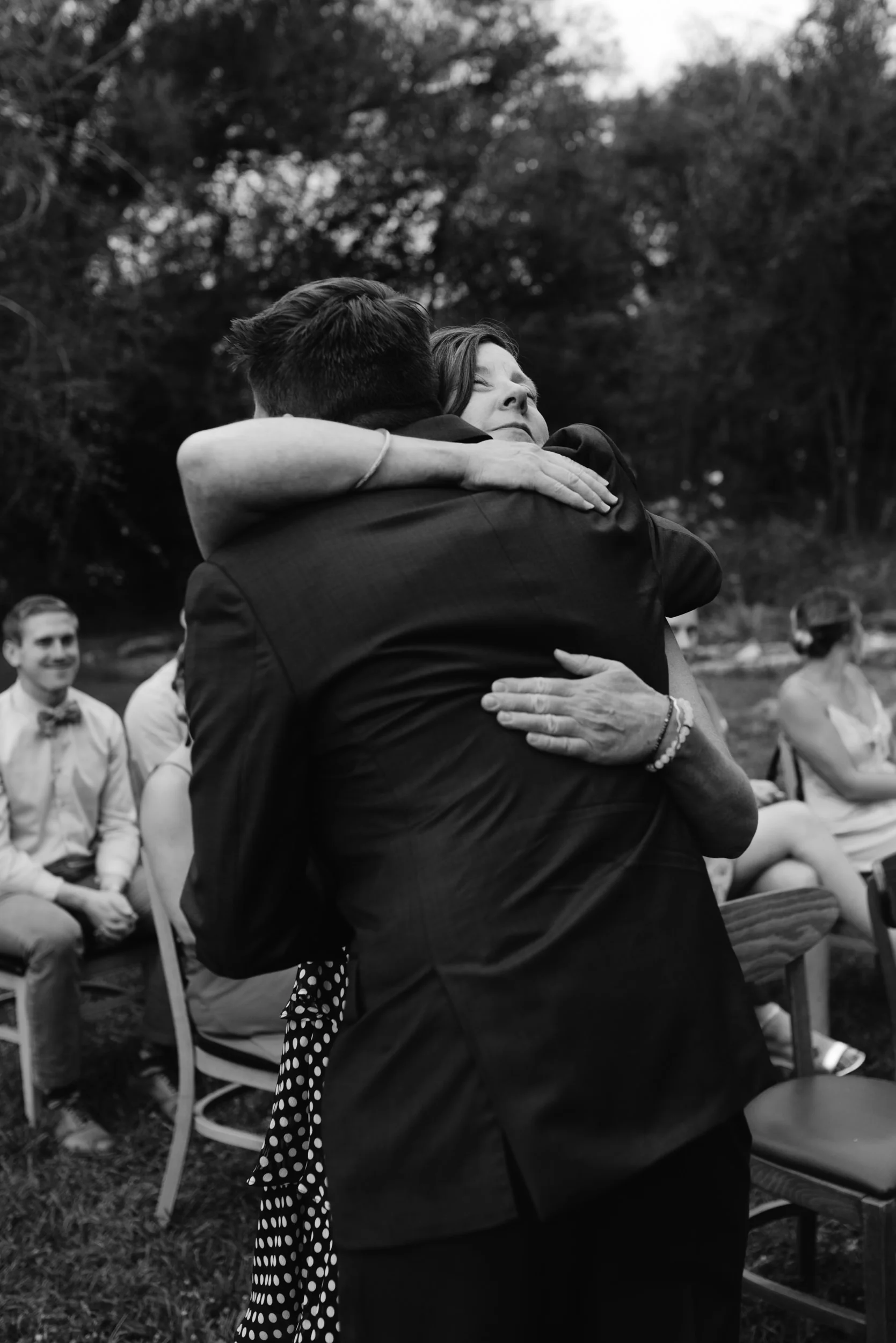  Groom and mom at Boulder wedding ceremony. Three Leaf Farm wedding. Colorado wedding and elopement photographer. 