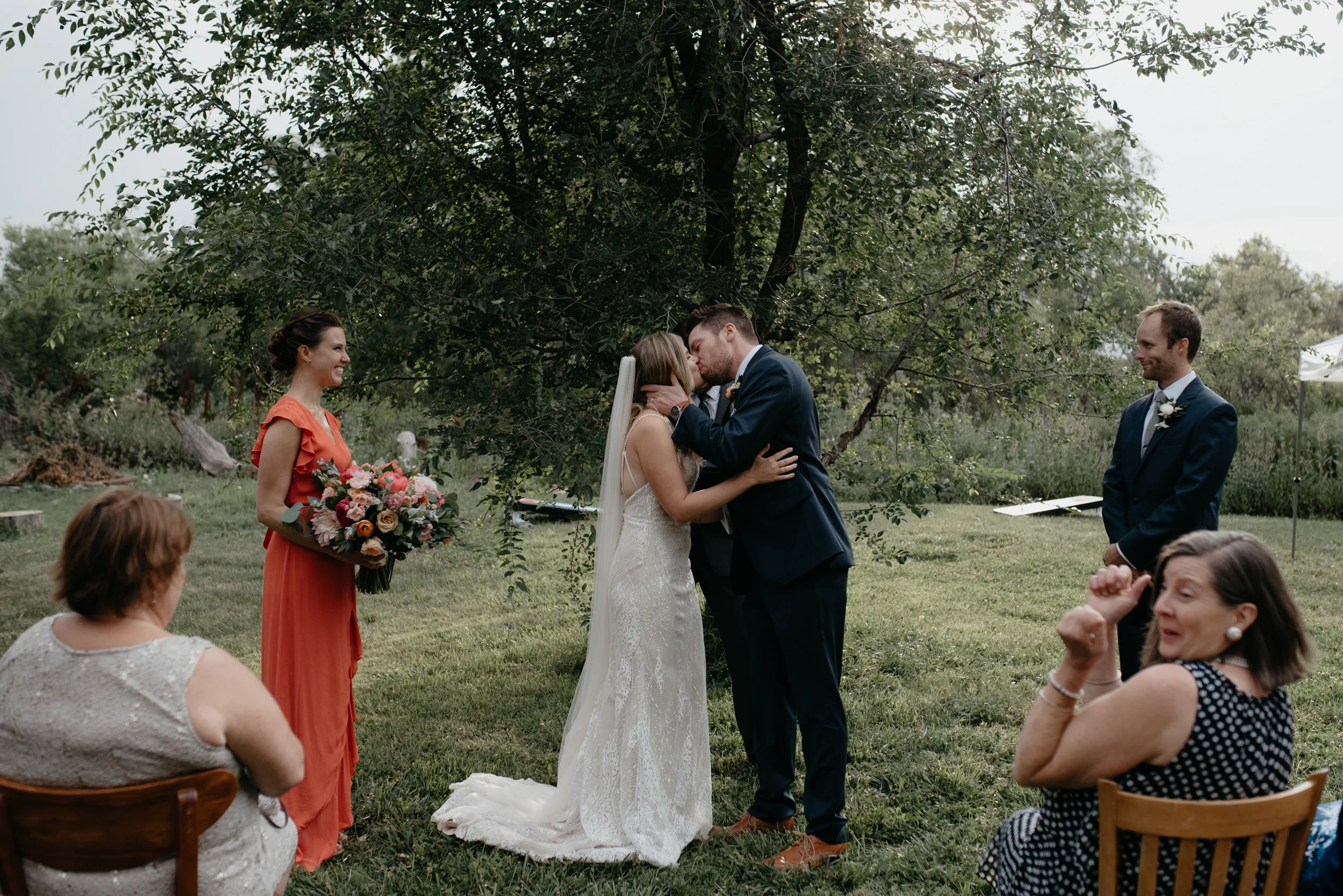  First kiss at Boulder, Colorado intimate wedding ceremony. Boulder, Colorado wedding photographer. 