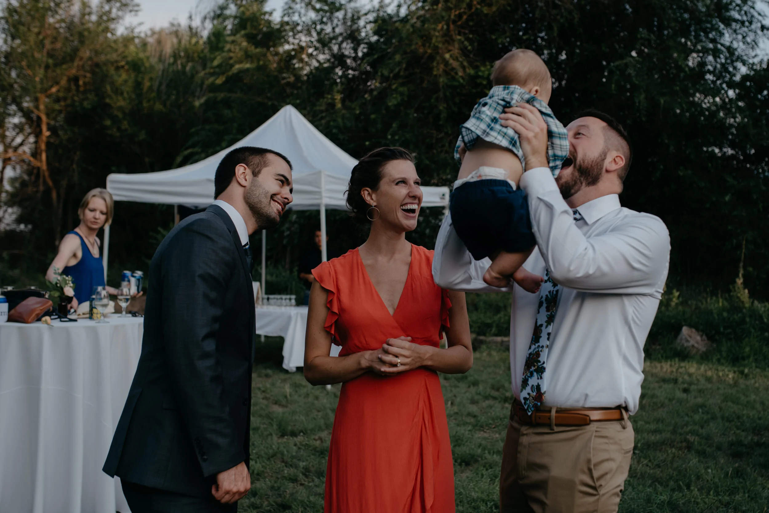  Guests having fun at cocktail hour. Three Leaf Farm wedding in Boulder, Colorado. 