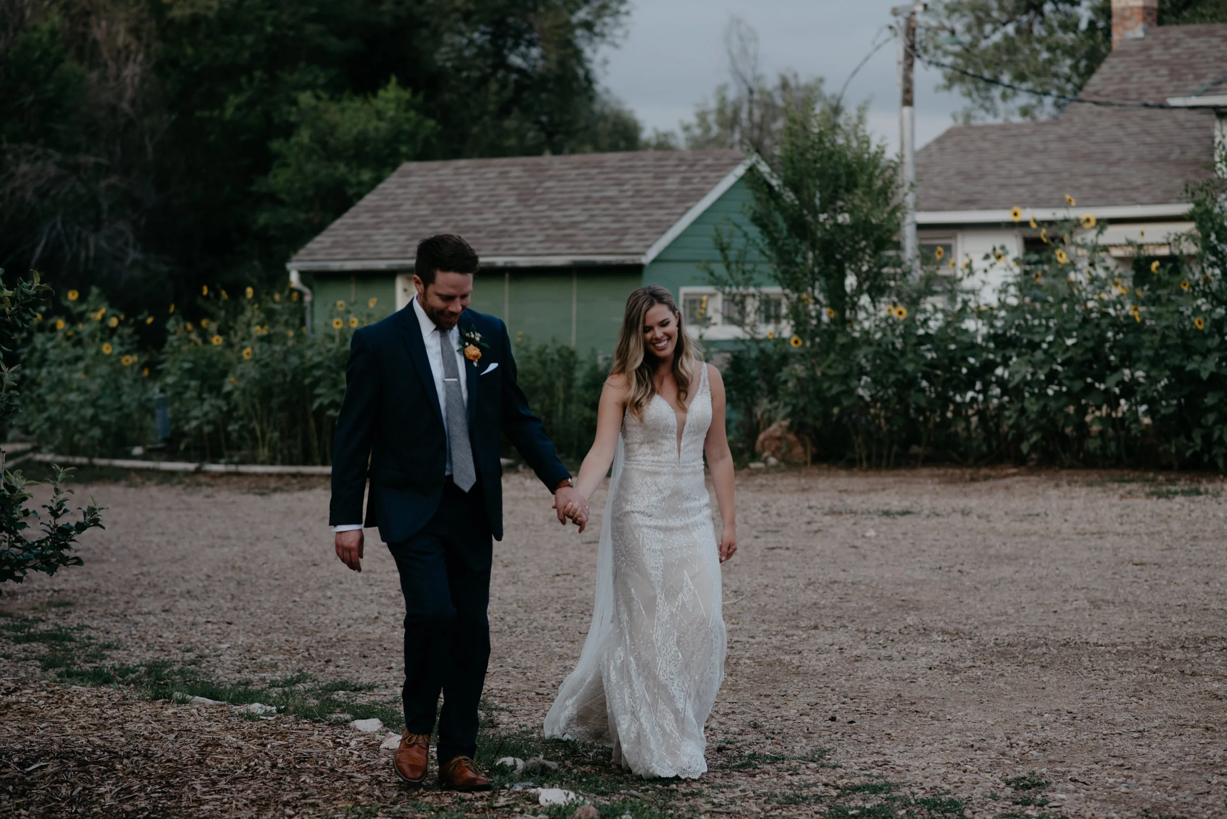  Bride and groom grand entrance. Boulder wedding photographer. Colorado wedding and elopement photographer. Rustic wedding in Boulder at Three Leaf Farm. 