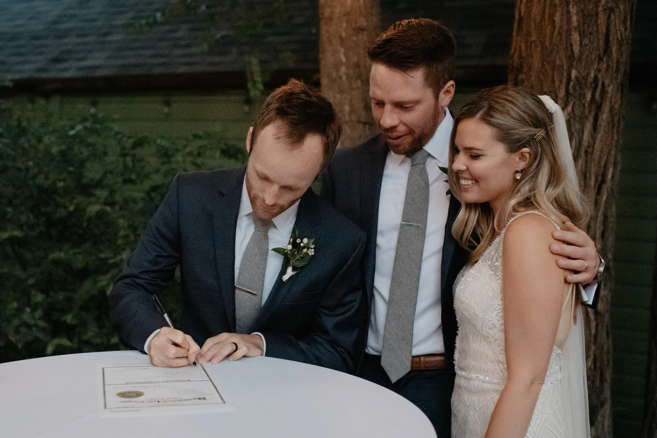  Boulder wedding photographer. Bride and groom signing marriage license. Colorado wedding and elopement photographer. 