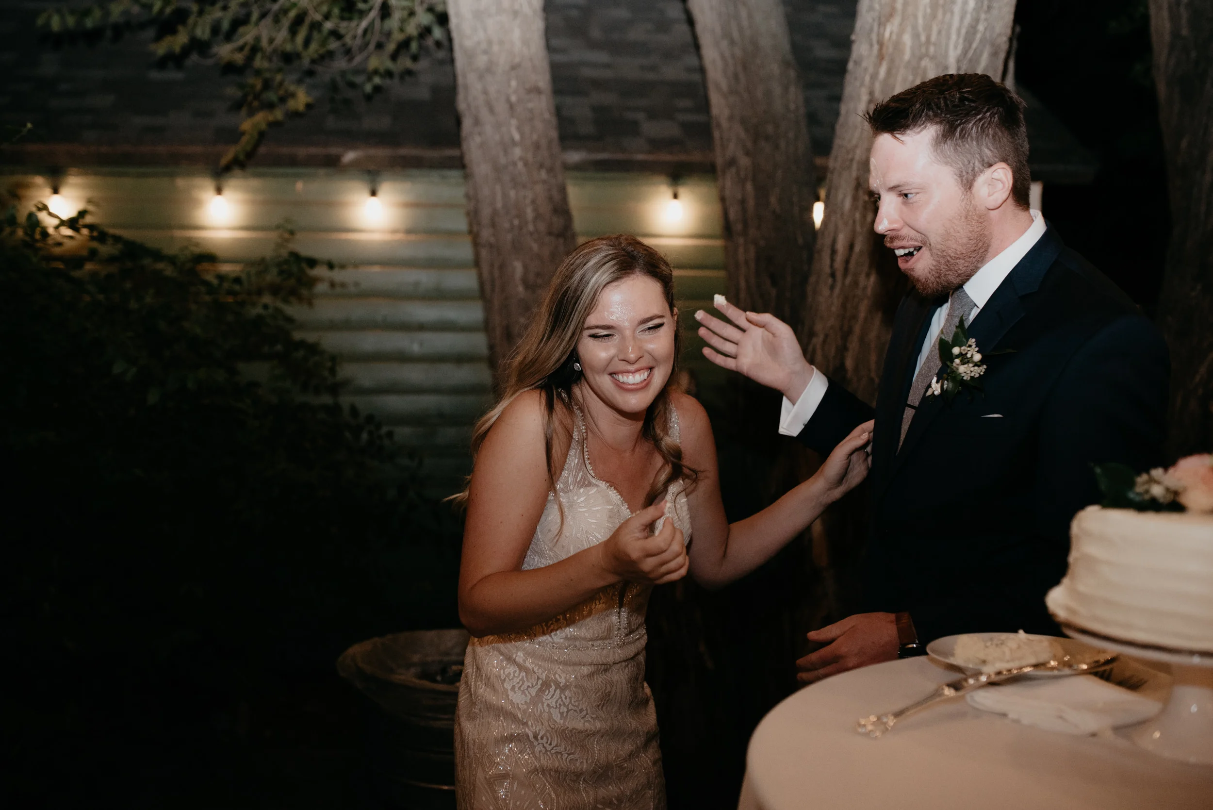  Bride and groom cutting the cake. Boulder, Colorado wedding at Three Leaf Farm. Denver affordable wedding photography. Colorado mountain wedding and elopement photographer. 