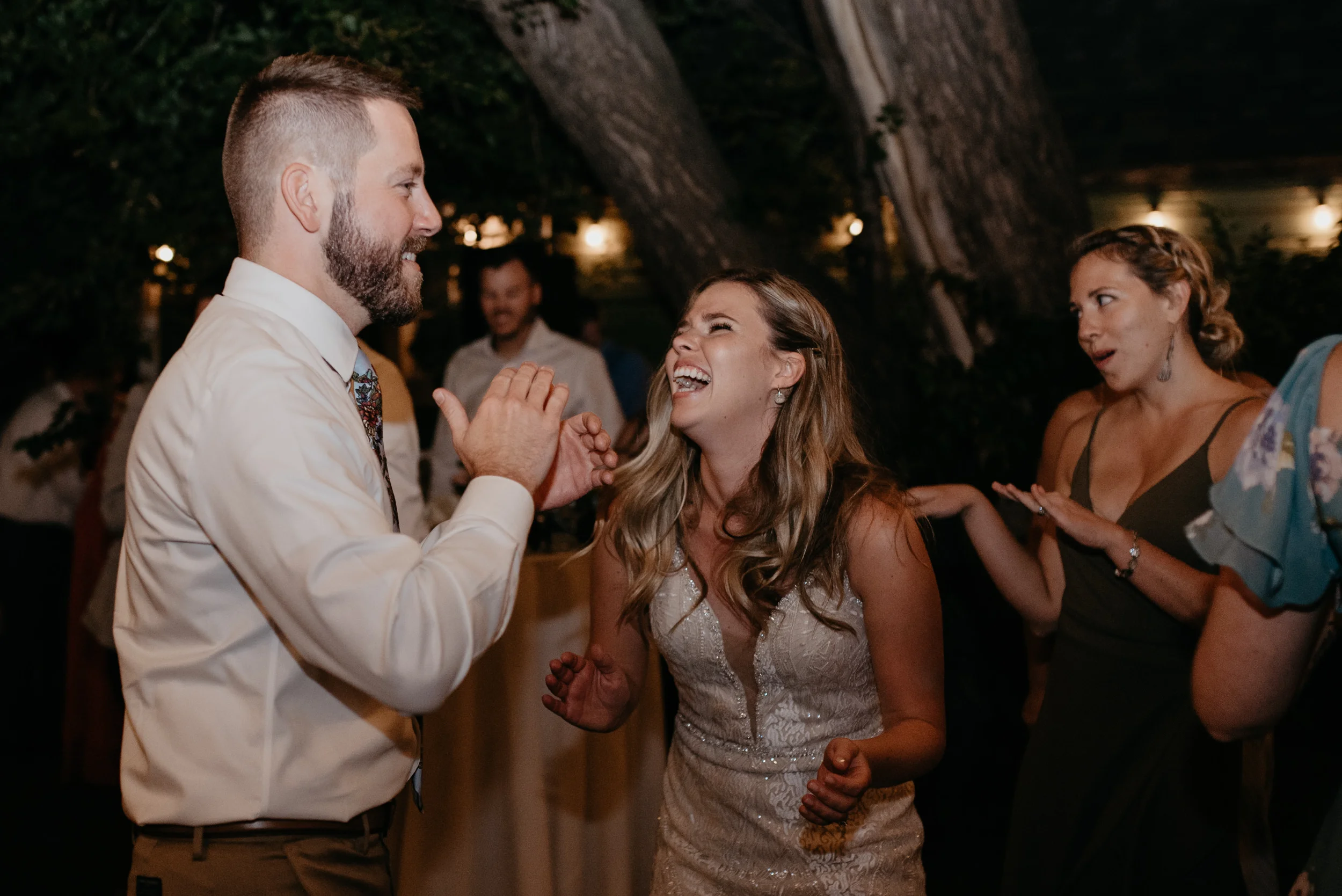  Colorado elopement and wedding photographer. Friends dancing at Boulder wedding reception. 