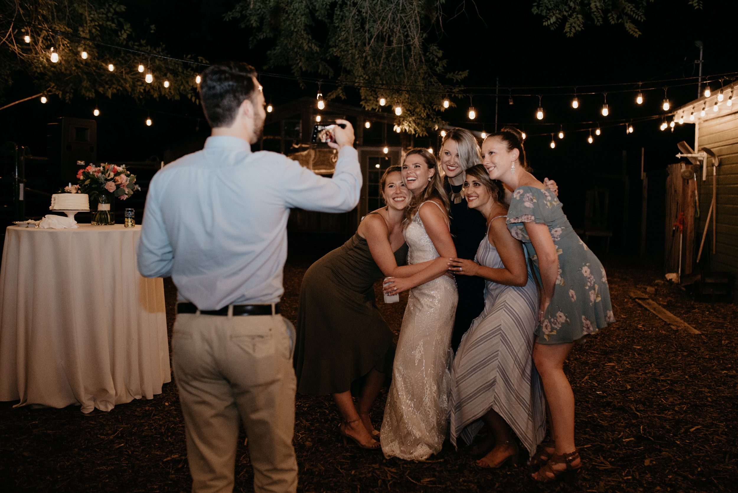  Friends taking photos at Three Leaf Farm wedding. Boulder, Colorado wedding and elopement photographer. 
