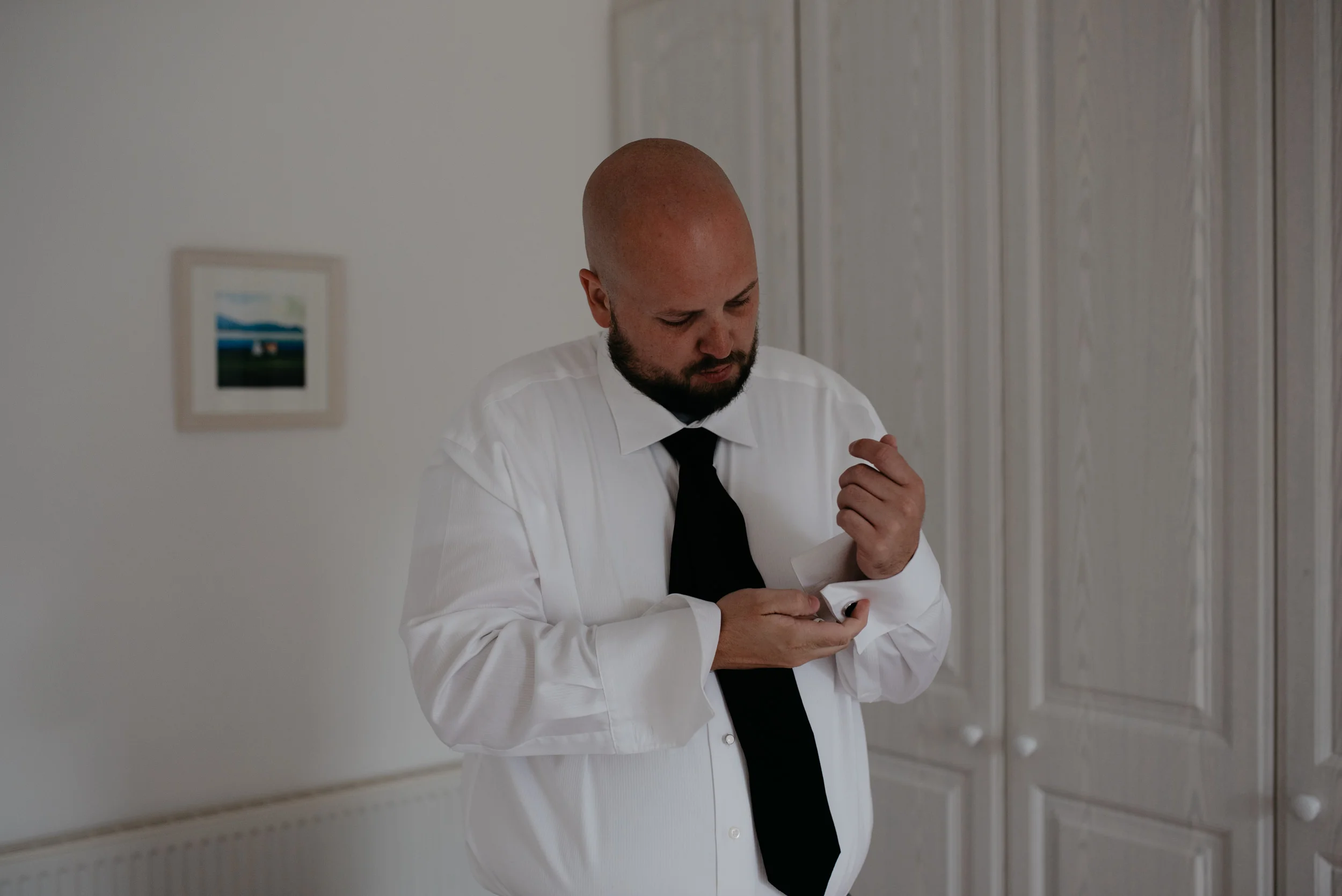  Photos of groom getting ready. Ireland destination wedding at Newtown Castle in County Clare. Ireland wedding and elopement photographer. 