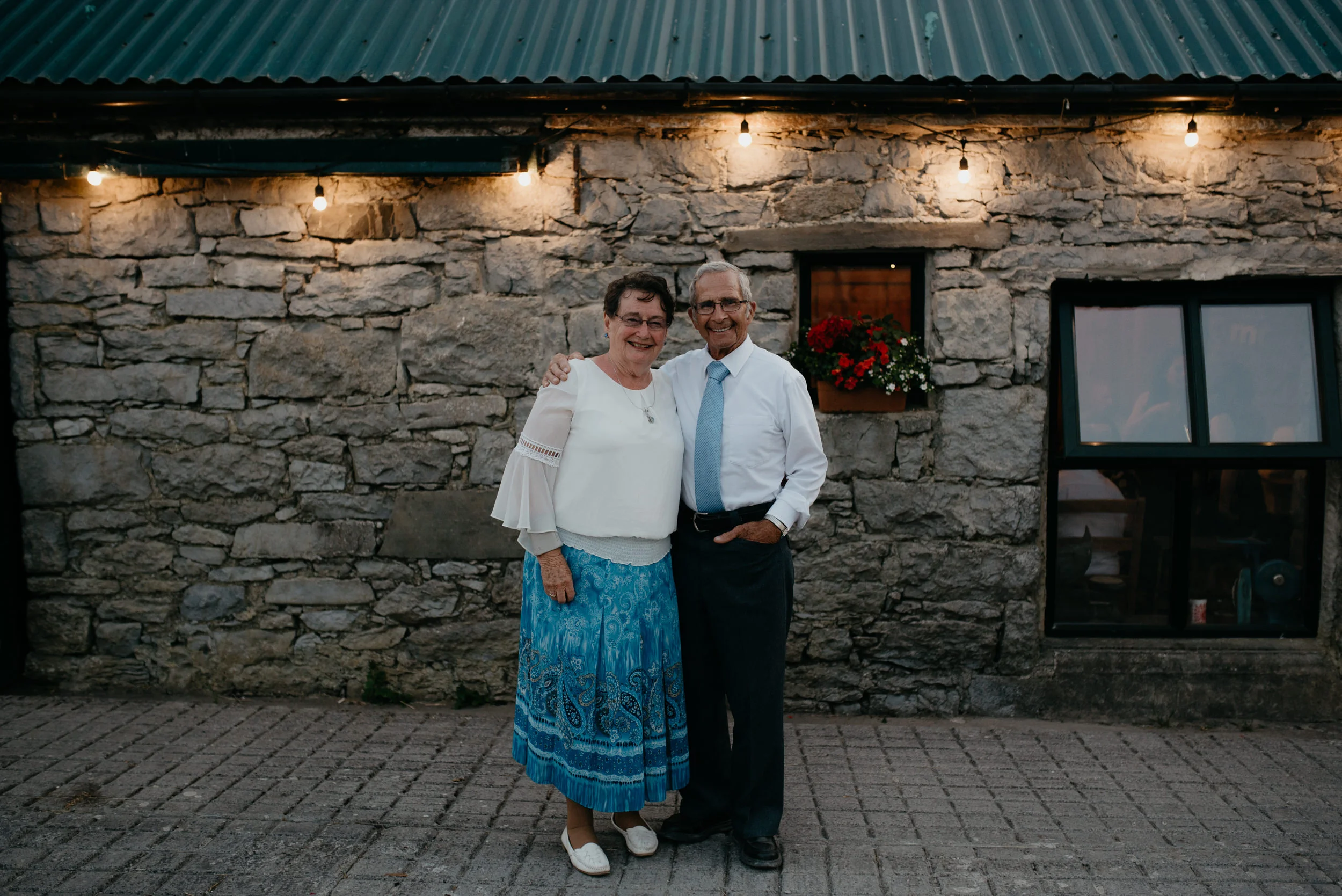  Wedding reception at Vaughan’s pub in Ireland. Ireland destination wedding and elopement photographer. County Clare, Ireland wedding photographer. Cliffs of Moher destination elopement.  