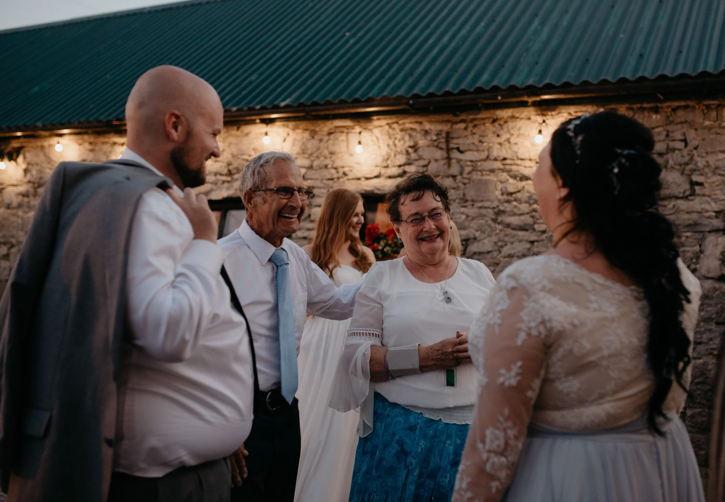  Wedding reception at Vaughan’s Pub for an Ireland destination elopement in County, Clare. Ireland wedding and elopement photographer. 