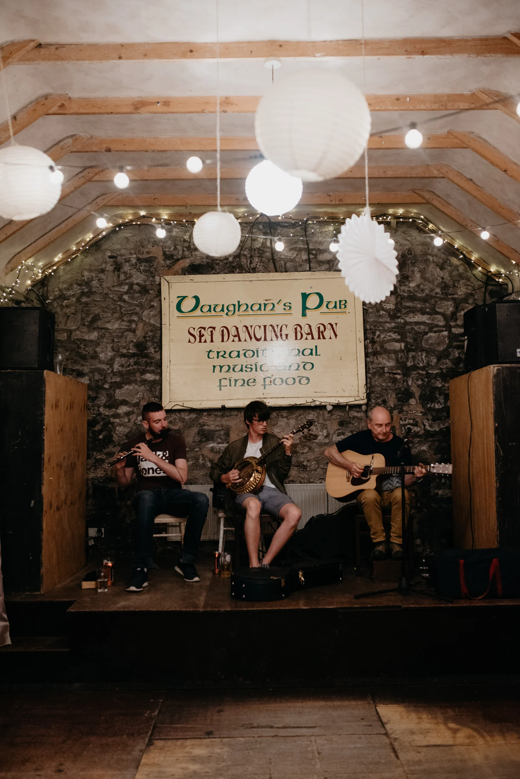  Folk band playing at Vaughan’s Pub in Kilfenora for a wedding reception. County Clare, Ireland wedding and elopement photographer. 