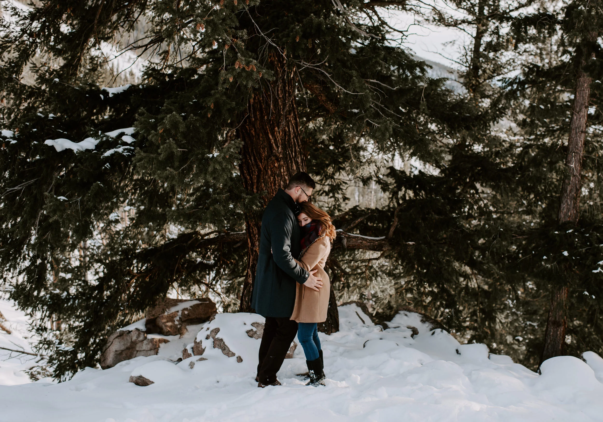  Snowy winter engagement session in Dillon, Colorado at Sapphire Point Overlook. 