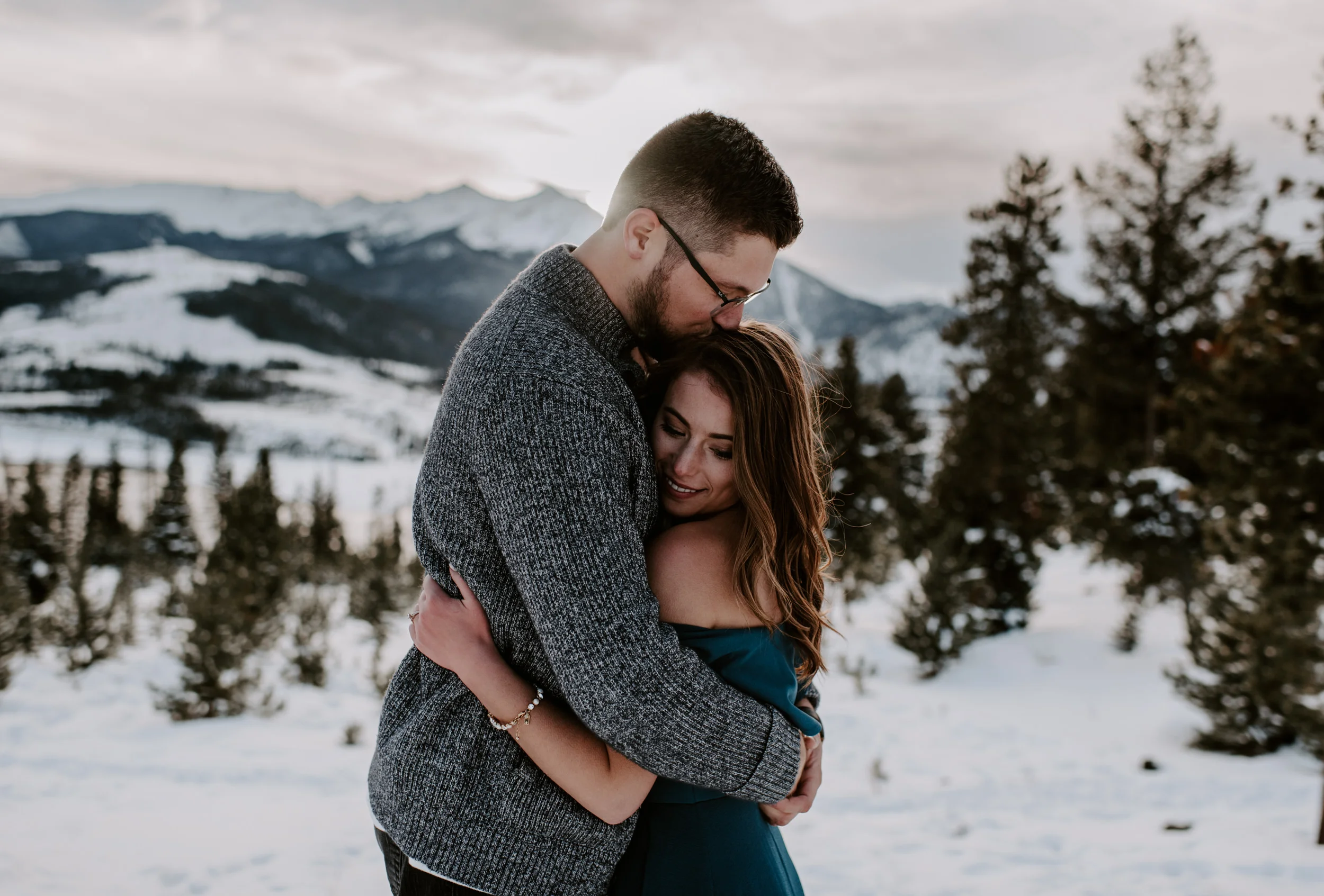  Colorado sunset engagement photos. Colorado mountain elopement at Sapphire Point. Colorado wedding photographer. Winter engagement session. 