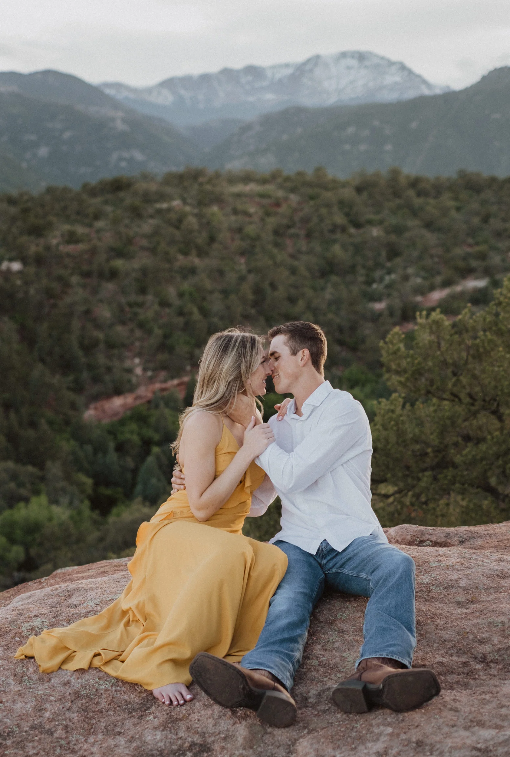  Garden of the Gods adventure engagement photographer. Colorado Springs engagement photos at Garden of the Gods. Colorado wedding photographer. Denver wedding photography. 