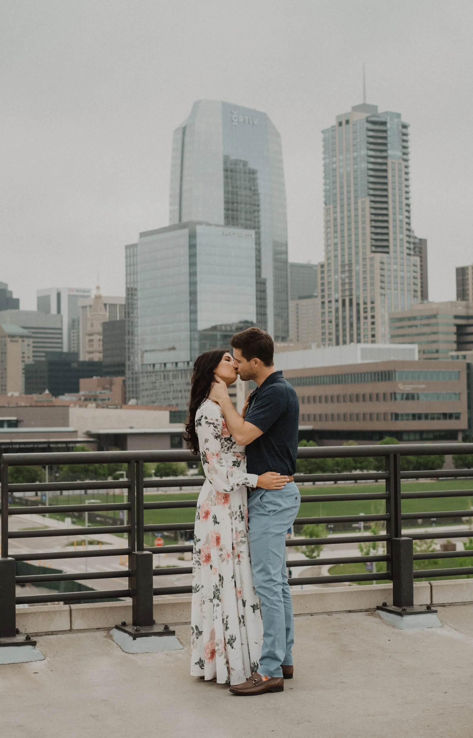  Downtown Denver rooftop engagement photos. Denver engagement session photographer. Kayla Hughes and The Bachelorette JJ Lane engagement session. Urban engagement photos in Denver, Colorado. 