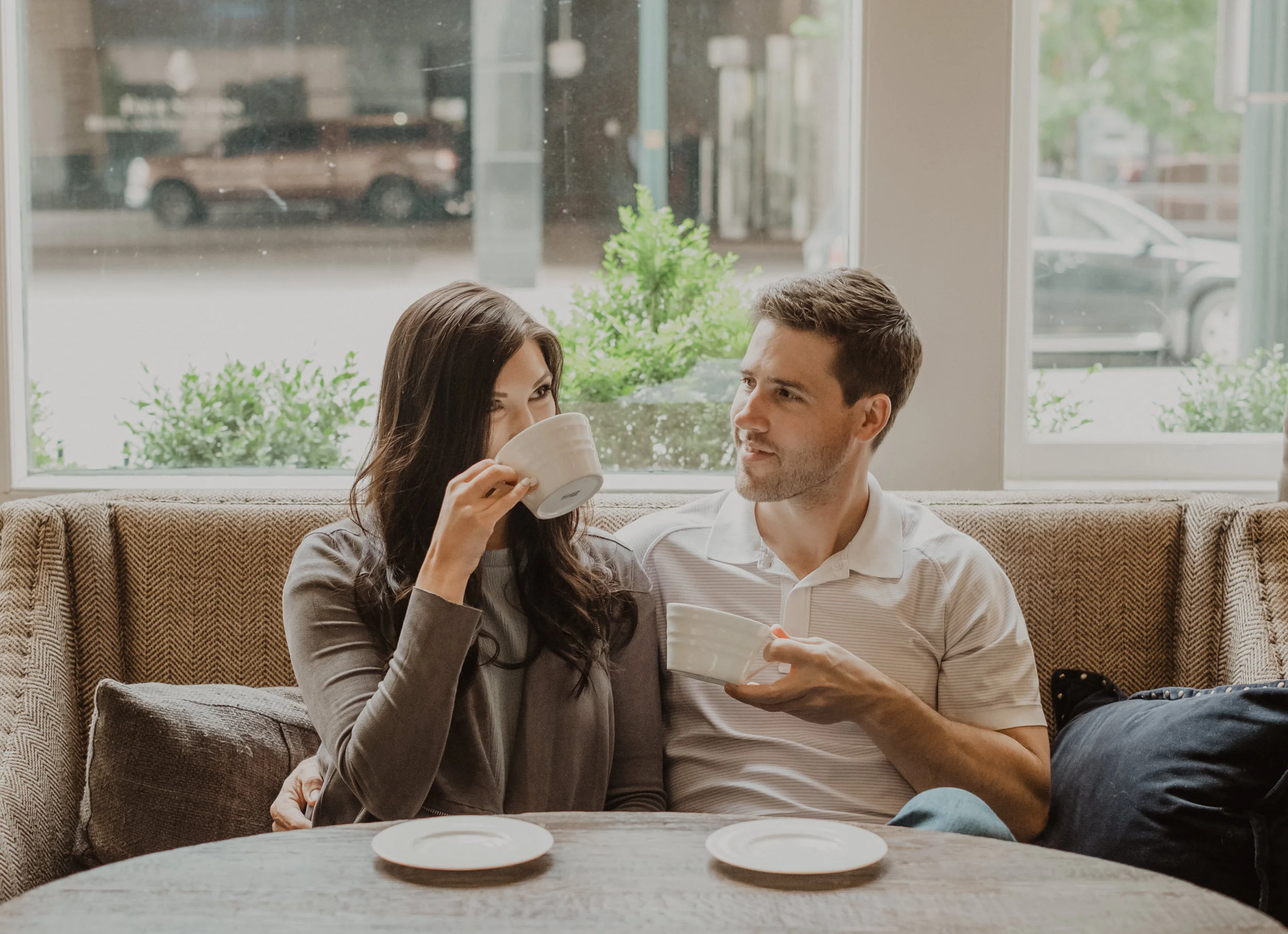  Downtown Denver engagement session at Hotel Teatro. Cozy coffee shop engagement ideas. Denver urban engagement session. Colorado wedding and elopement photographer. 