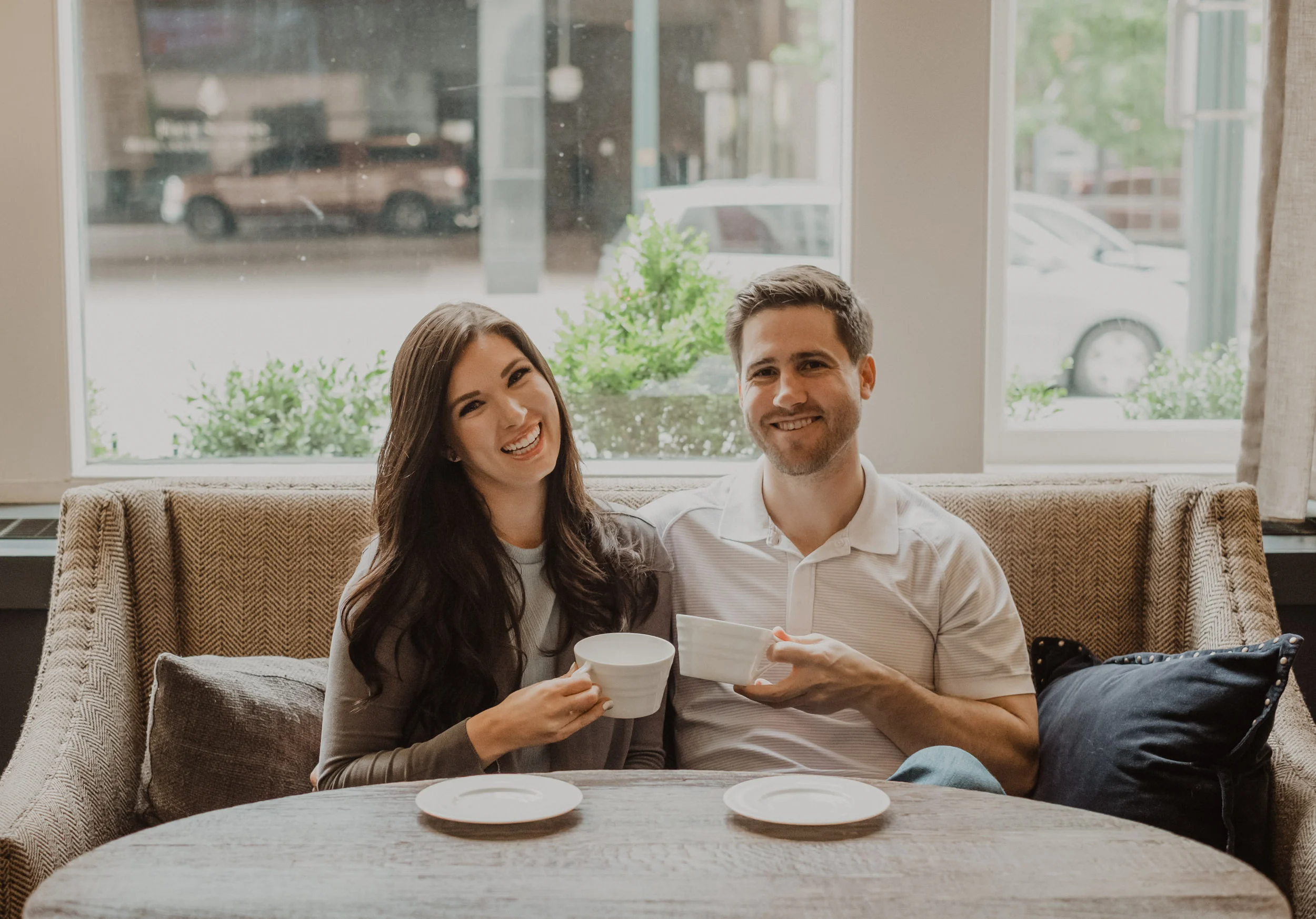  Downtown Denver engagement session at Hotel Teatro. Cozy coffee shop engagement photos. Urban engagement session. Engagement ideas. Colorado wedding photographer.  