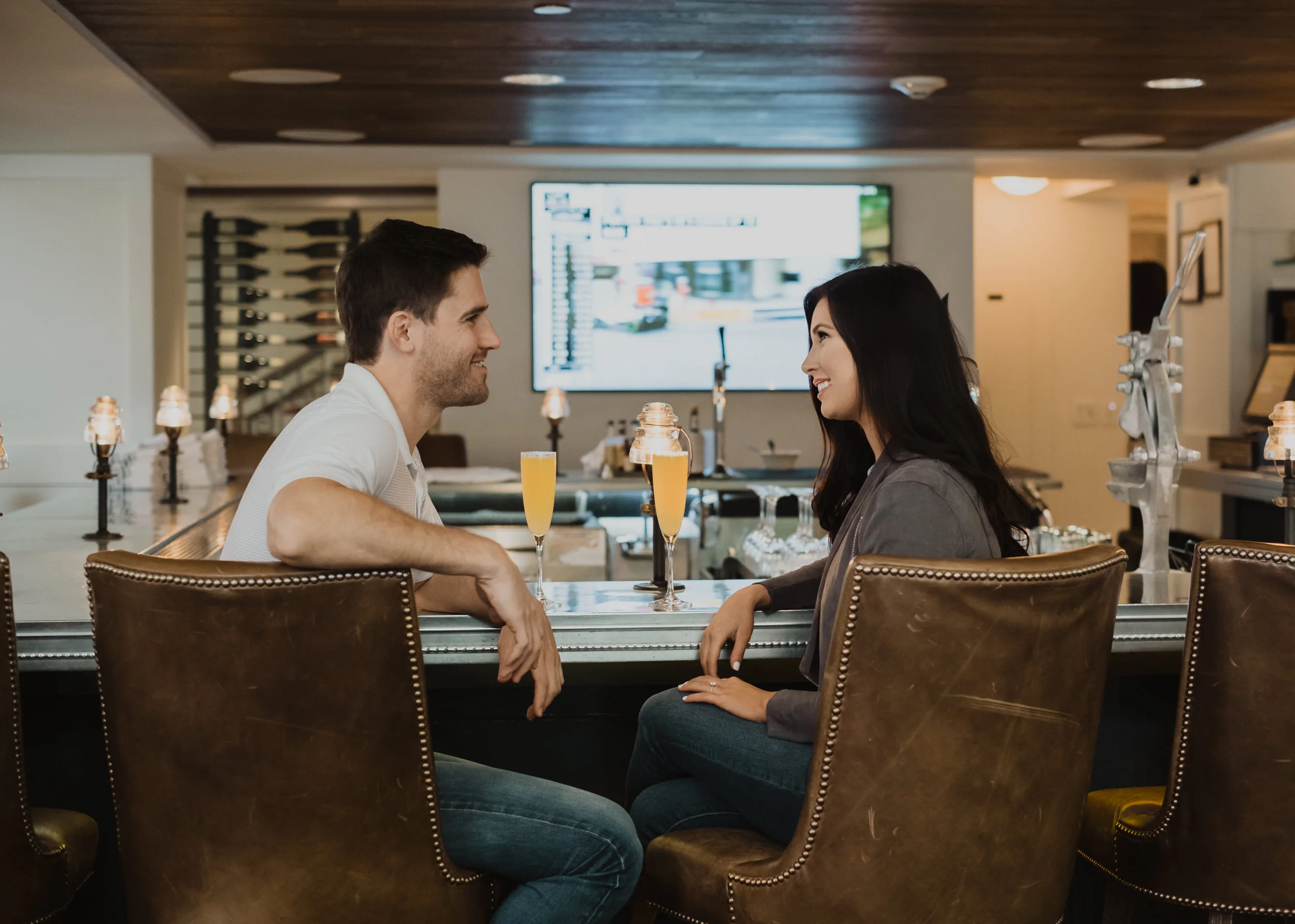  Downtown Denver urban engagement session at Hotel Teatro. Cozy urban engagement session photo ideas. Downtown Denver, Colorado engagement photography. Colorado wedding and elopement photographer. City engagement session inspiration. 