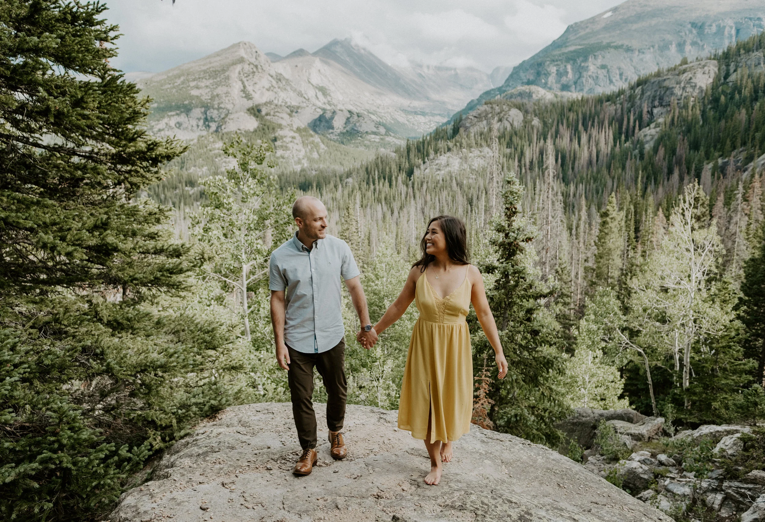  Dream Lake engagement session photographer. Colorado engagement session photo ideas. Colorado mountain engagement photos. Rocky Mountain National Park engagement session. Colorado engagement photo photographer. Colorado mountain wedding photographer. Estes Park elopement photographer. 