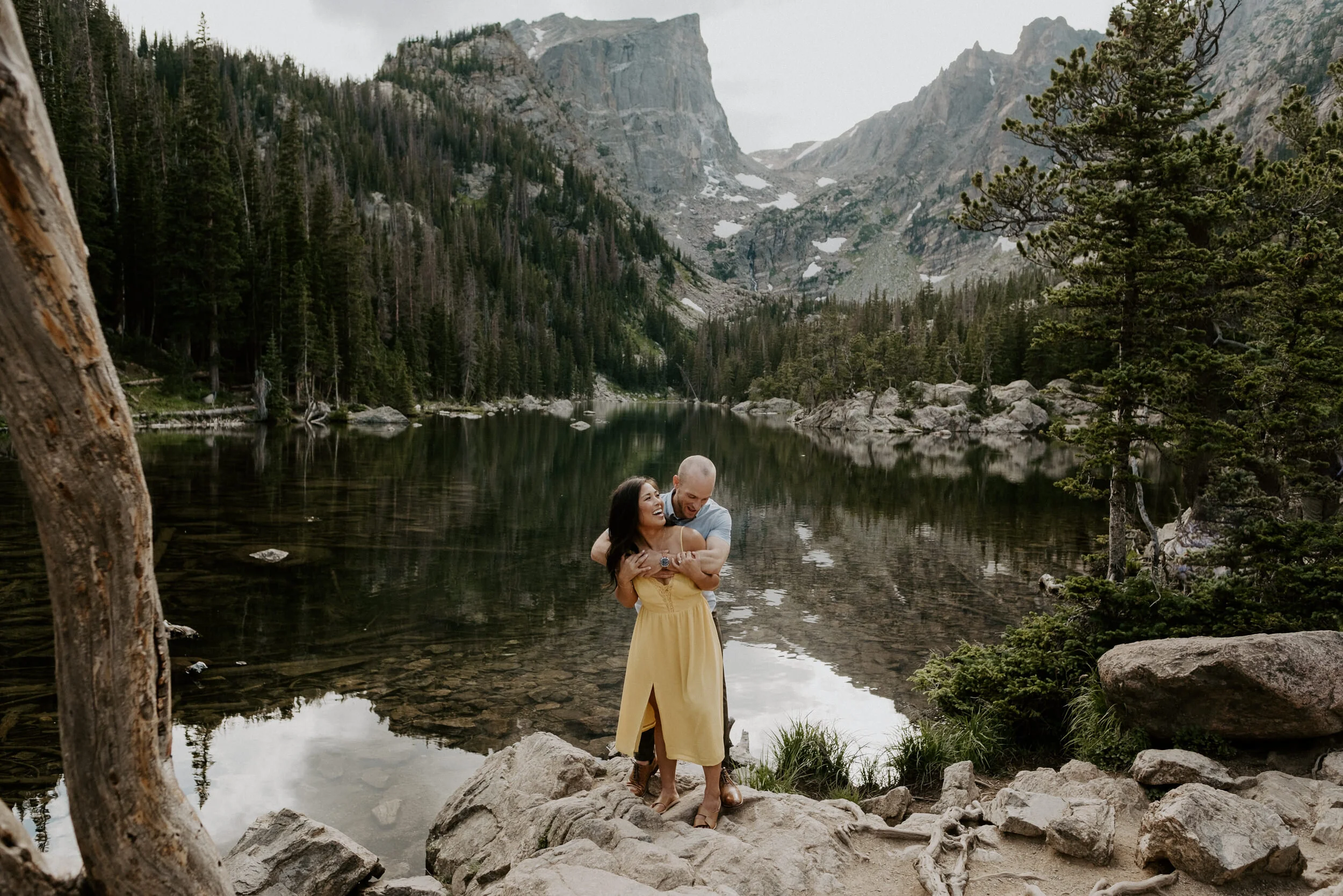  Rocky Mountain National Park hiking engagement session at Dream Lake. Dream Lake engagement session in Estes Park, Colorado. Estes Park engagement session location ideas. Colorado wedding photographer. Estes Park elopement photographer. Rocky Mountain National Park engagement photos. Colorado adventure engagement photography. 