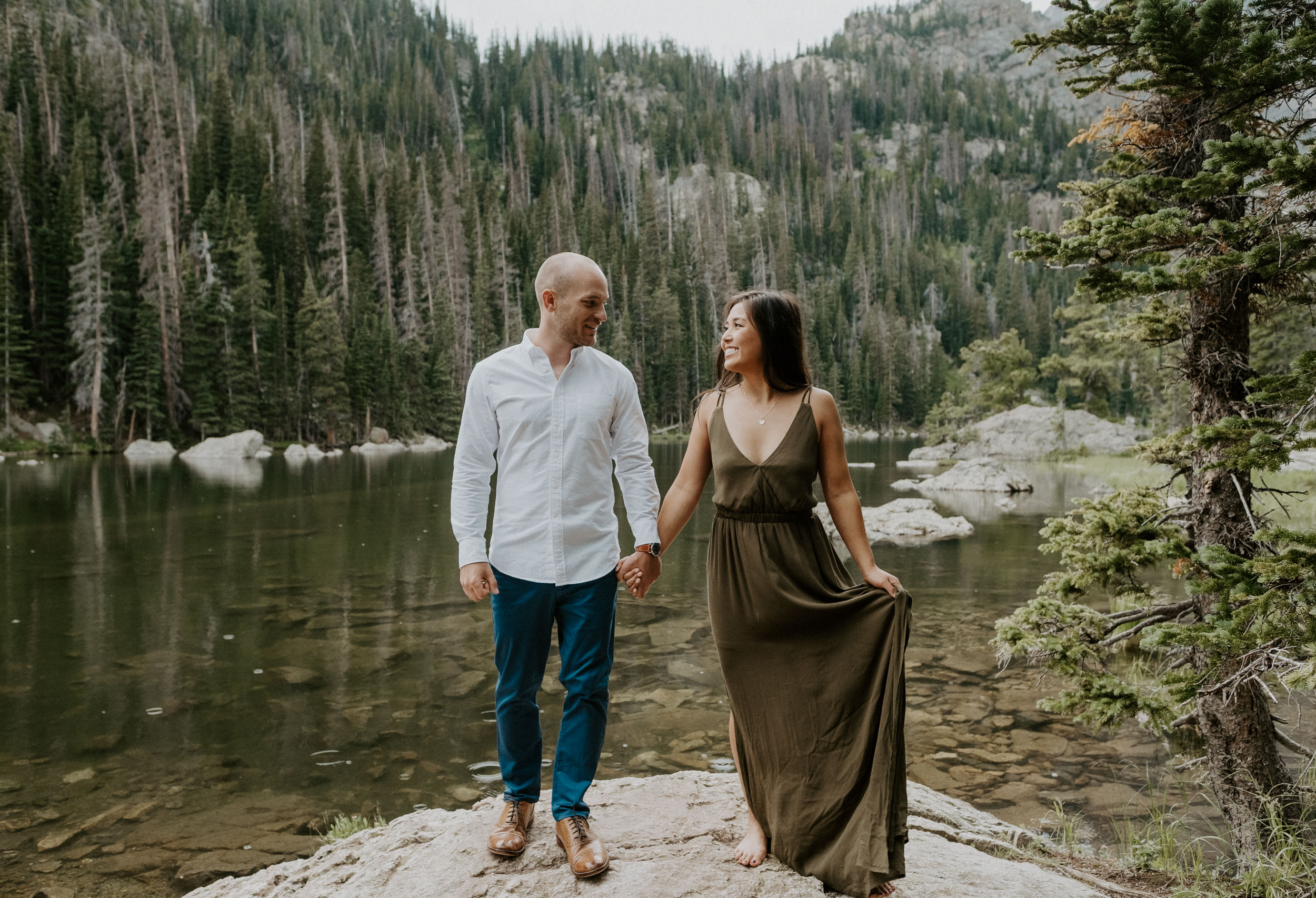  Estes Park engagement photos in Rocky Mountain National Park. Dream Lake engagement session in Estes Park, Colorado. Estes Park engagement session location ideas. Colorado wedding photographer. Estes Park elopement photographer. Rocky Mountain National Park engagement photos. Colorado adventure engagement photography. 