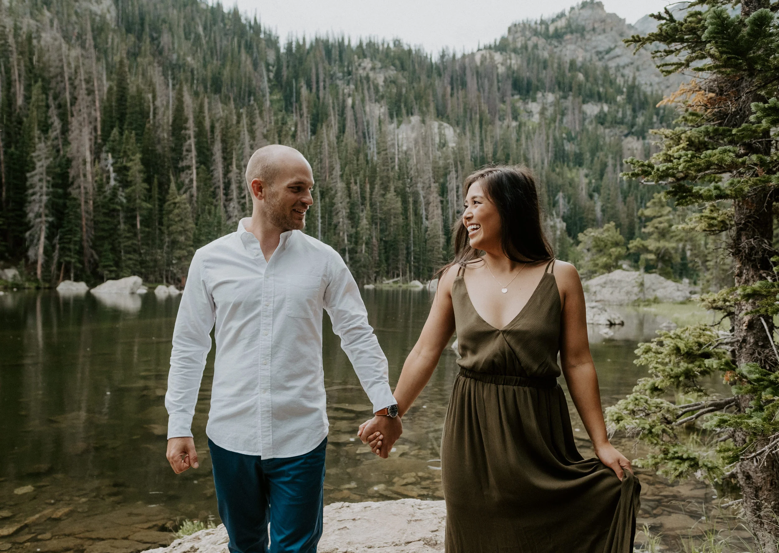  Estes Park, Colorado engagement and elopement photography. Dream Lake sunset engagement session Rocky Mountain National Park hiking engagement session.. Dream Lake engagement session in Estes Park, Colorado. Estes Park engagement session location ideas. Colorado wedding photographer. Estes Park elopement photographer. Rocky Mountain National Park engagement photos. Colorado adventure engagement photography. 