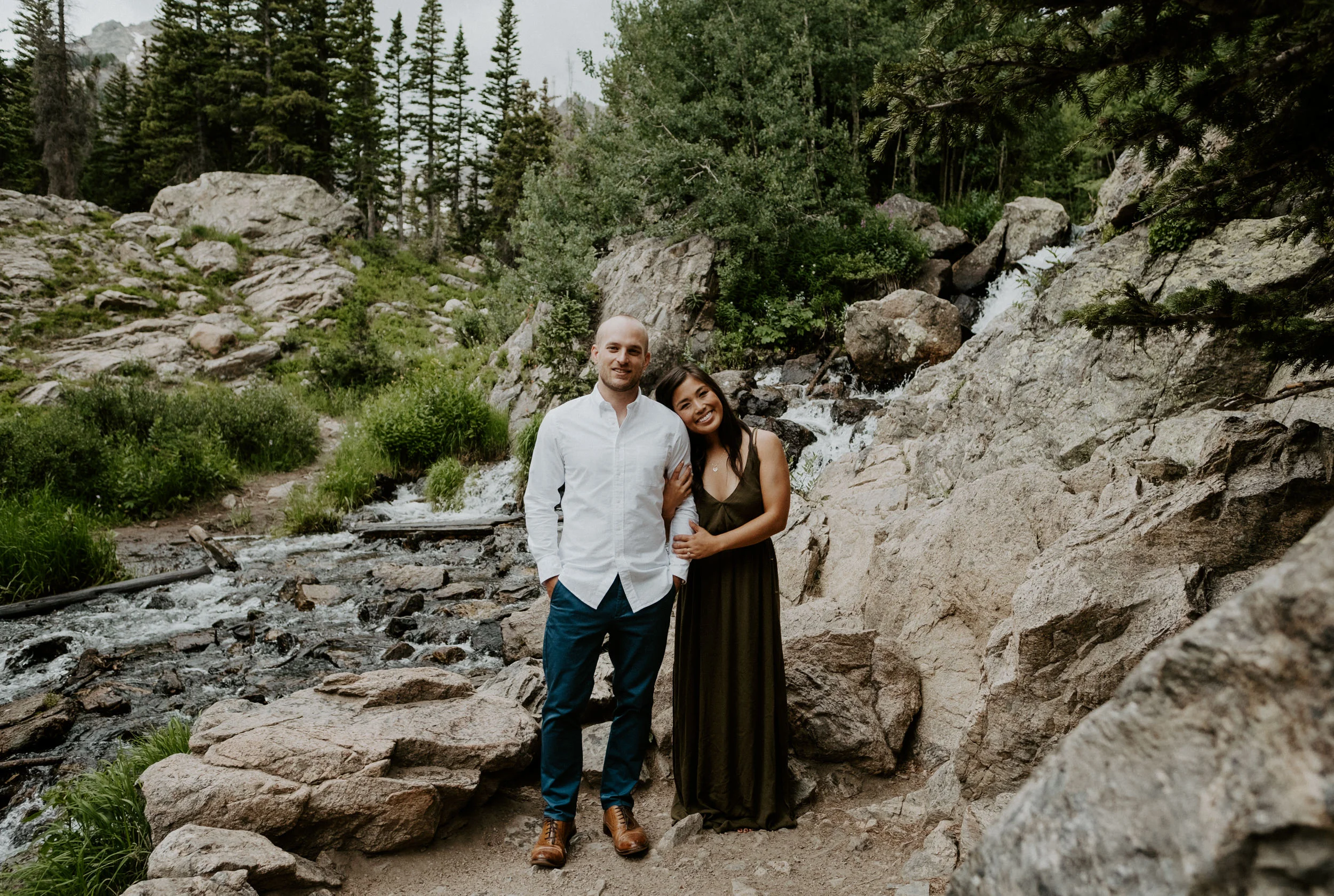  Rocky Mountain National Park hiking engagement session at Dream Lake. Dream Lake engagement session in Estes Park, Colorado. Estes Park engagement session location ideas. Colorado wedding photographer. Estes Park elopement photographer. Rocky Mountain National Park engagement photos. Colorado adventure engagement photography. Estes Park wedding photography. 