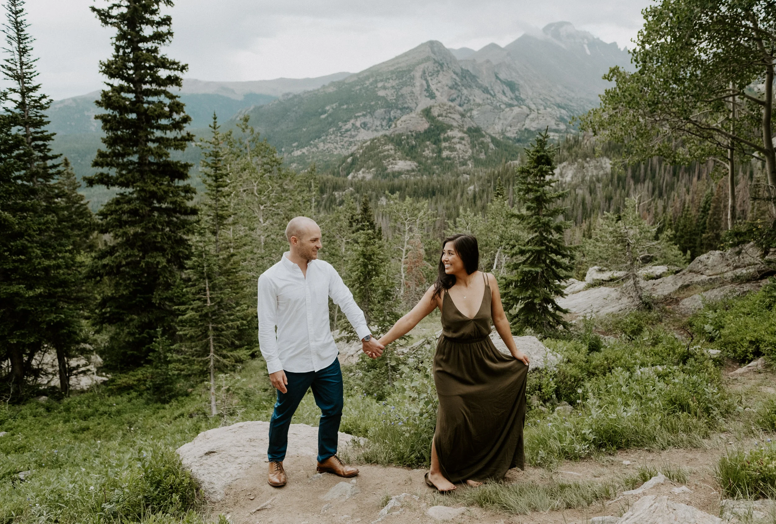  Colorado adventure engagement session in Rocky Mountain National Park. Estes Park wedding and elopement photographer. Denver wedding photographer. Dream Lake engagement photos. Rocky Mountain National Park engagement session. Colorado elopement photography. 