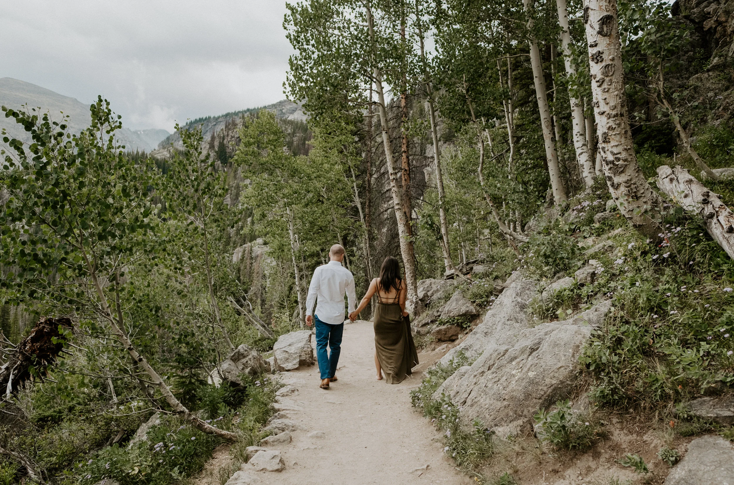  Dream Lake adventure engagement session in Rocky Mountain National Park. Rocky Mountain National Park engagement photographer. Colorado wedding and elopement photographer. Estes Park wedding photographer. 