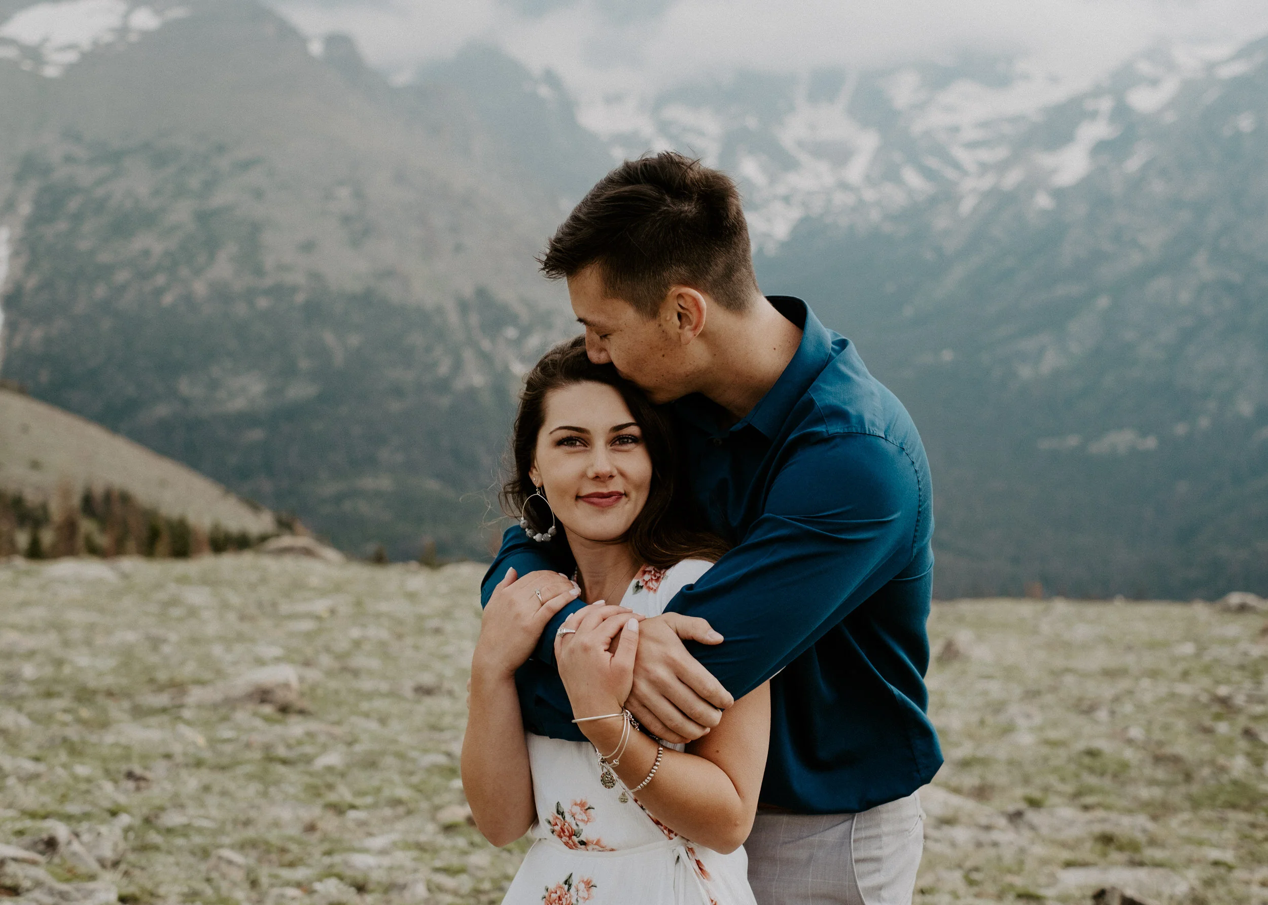  Colorado mountain engagement session in Estes Park. Estes Park engagement session photographer.. Colorado adventure engagement and elopement photographer. Trail Ridge Road engagement photos in Rocky Mountain National Park. Colorado engagement session photo ideas. Engagement session posing inspiration. Engagement session outfit ideas. 