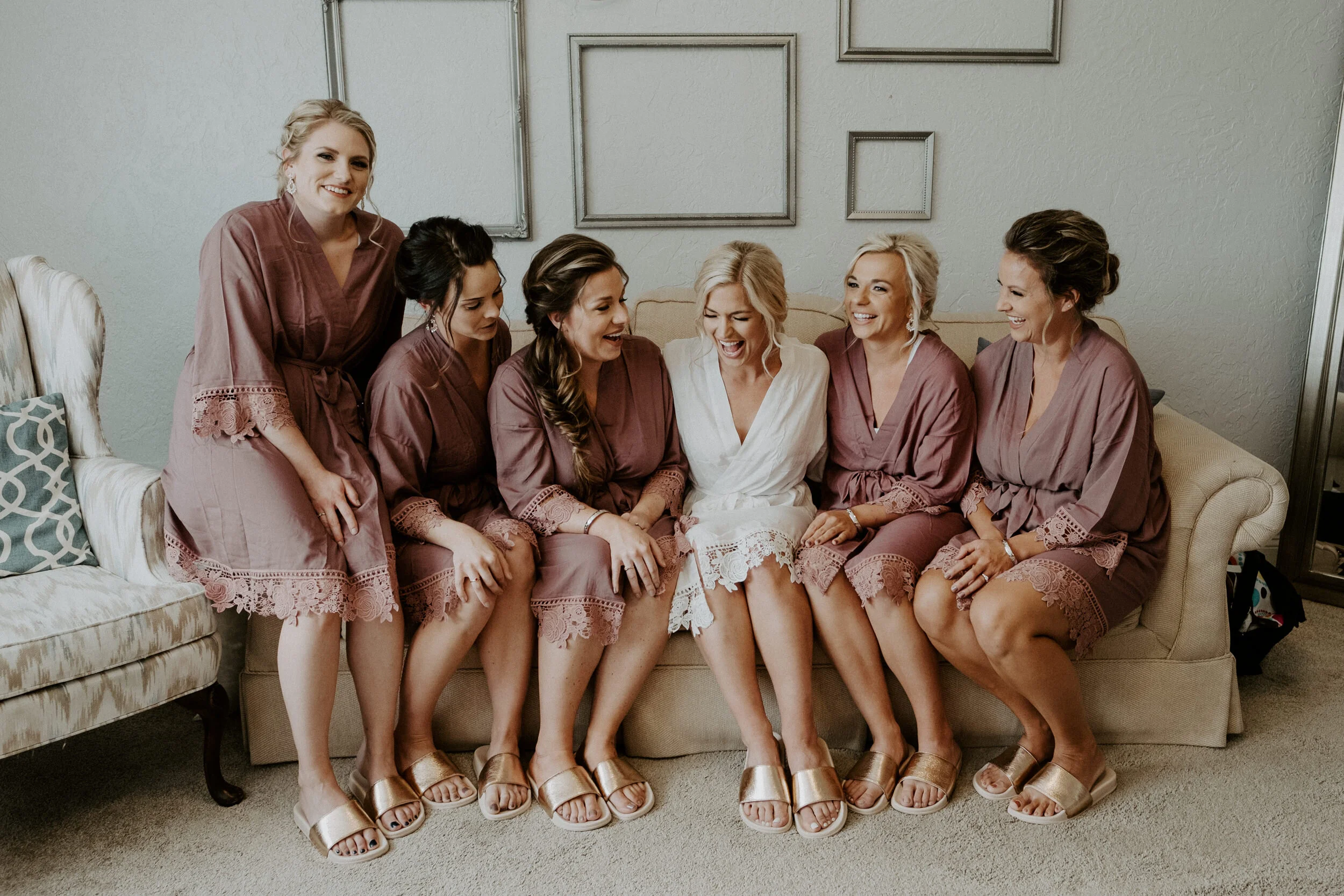  Perry Park Country Club wedding in Larkspur, Colorado. Getting ready photos at Perry Park Country Club. Getting ready outfit ideas. Wedding party getting ready. Colorado wedding photographer. Colorado elopement photographer. Bridesmaids wedding day robe ideas. 