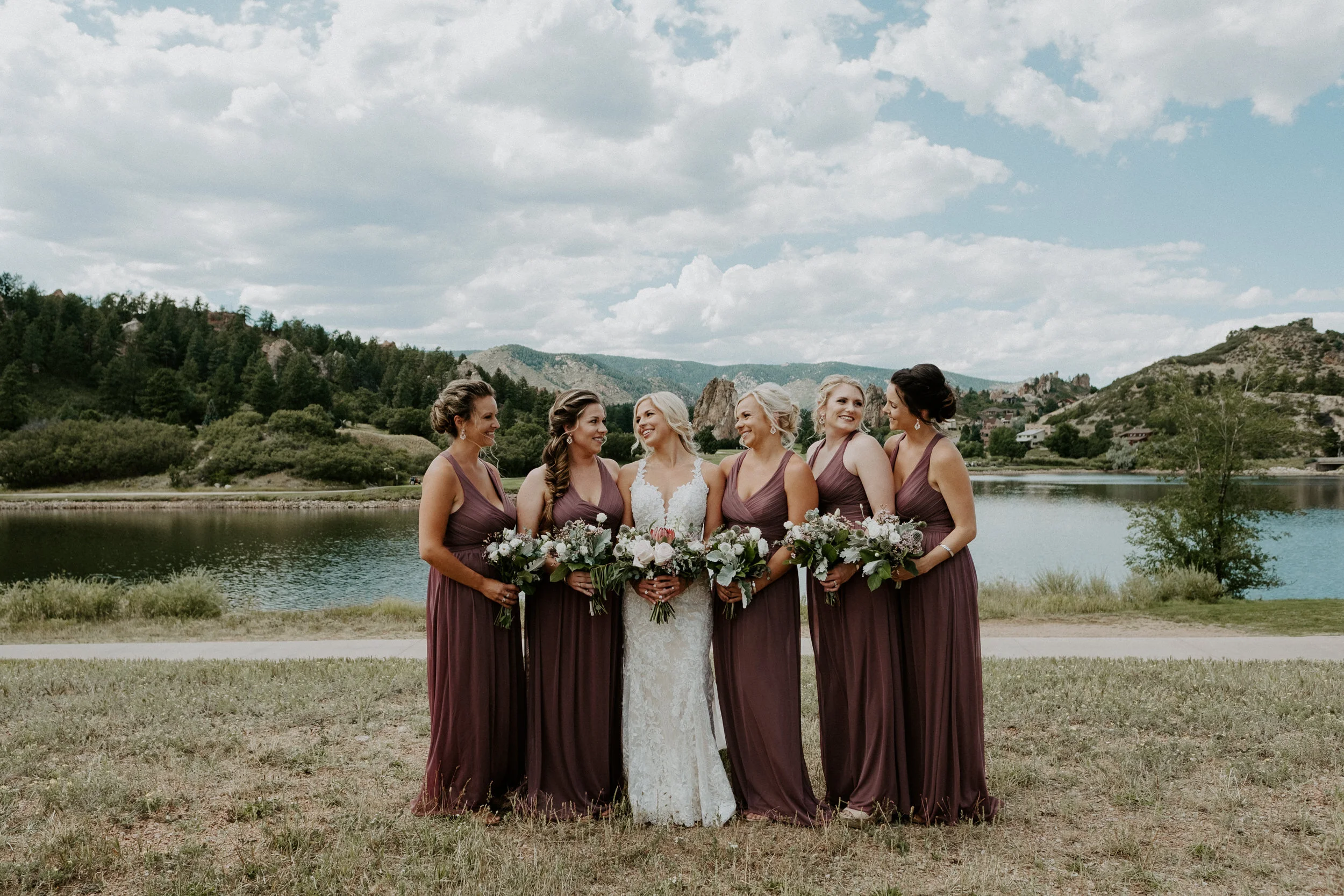  Perry Park Country Club wedding in Larkspur, Colorado. Bridesmaids photos at Perry Park Country Club. Bridesmaids dress ideas. Bridesmaids photos posing ideas. Wedding party ideas. Colorado wedding photographer. Colorado mountain elopement photographer. Colorado mountain wedding venue. 