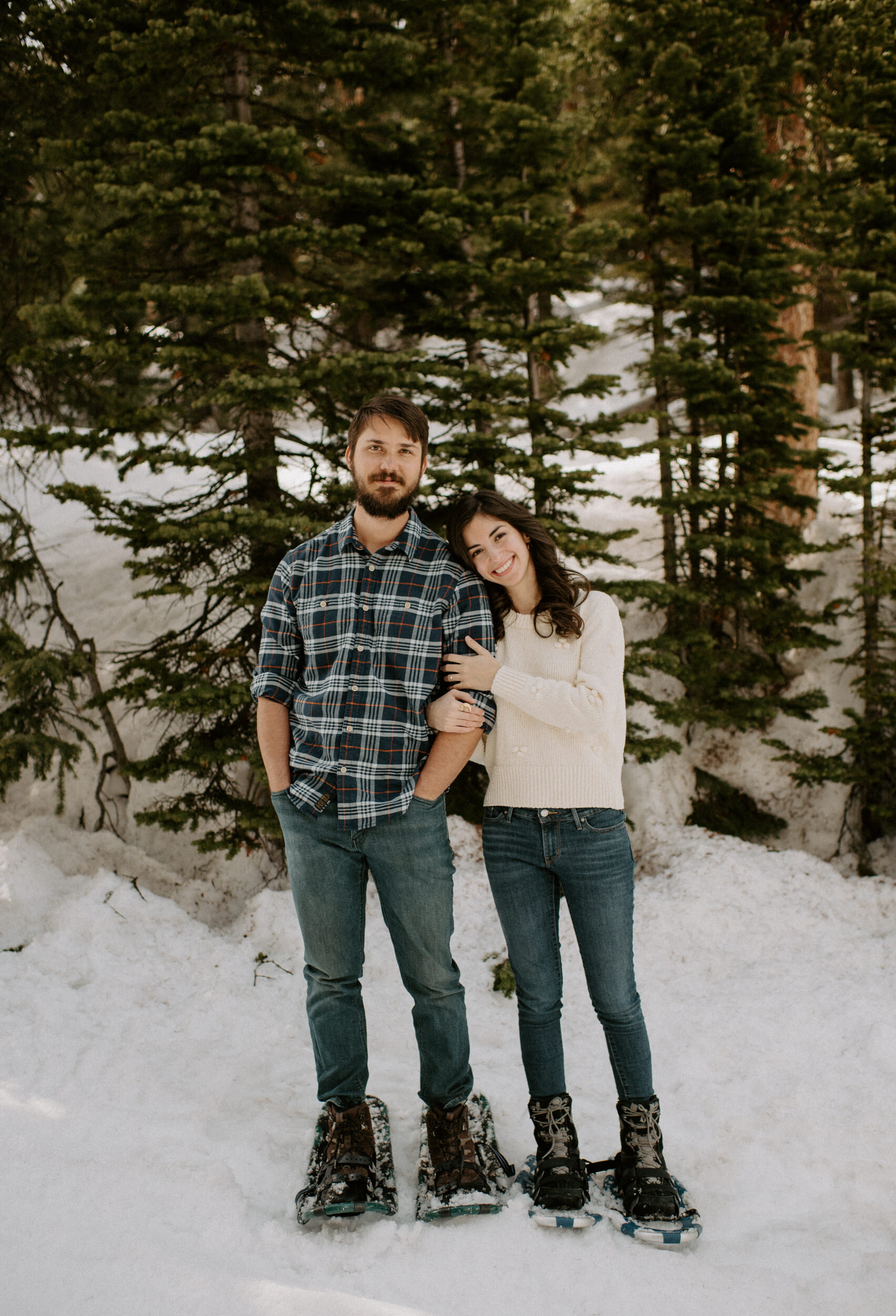  Winter Park, Colorado engagement session. Colorado engagement photos. Colorado engagement session photography. Alyssa Carpenter Photo. Engagement session outfit ideas. Adventure engagement session.  Snowshoeing engagement session.  