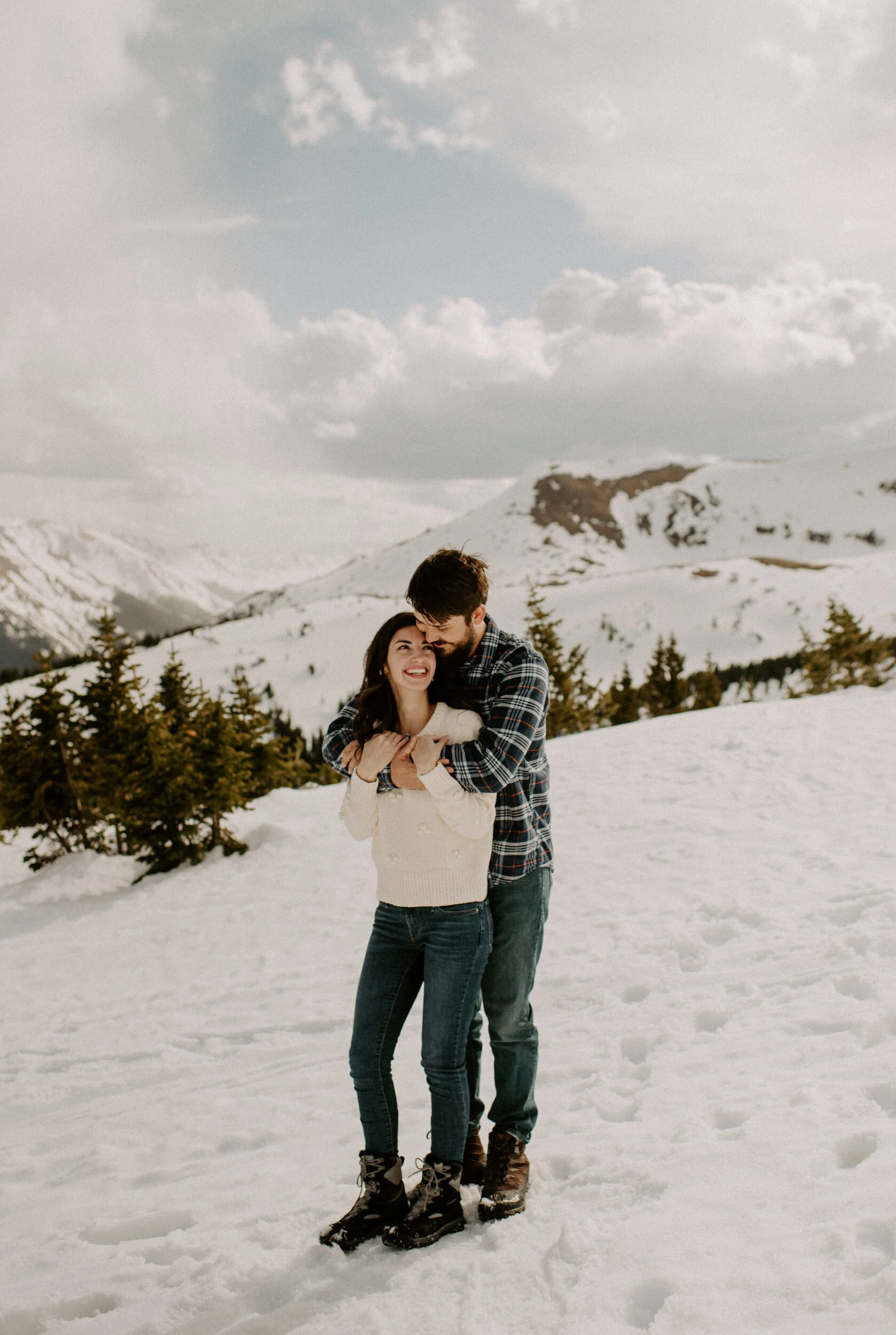  Winter Park, Colorado engagement session. Colorado engagement photos. Colorado engagement session photography. Alyssa Carpenter Photo. Engagement session outfit ideas. Adventure engagement session.  Winter Park, Colorado wedding photographer. Engagement session posing ideas. Winter engagement session.  