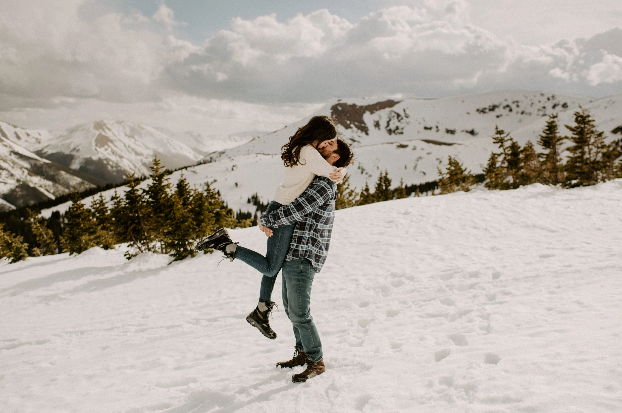  Winter Park, Colorado engagement session. Colorado engagement photos. Colorado engagement session photography. Alyssa Carpenter Photo. Engagement session outfit ideas. Adventure engagement session.  Winter Park, Colorado wedding photographer. Snowy engagement session. Colorado wedding and elopement photography.  