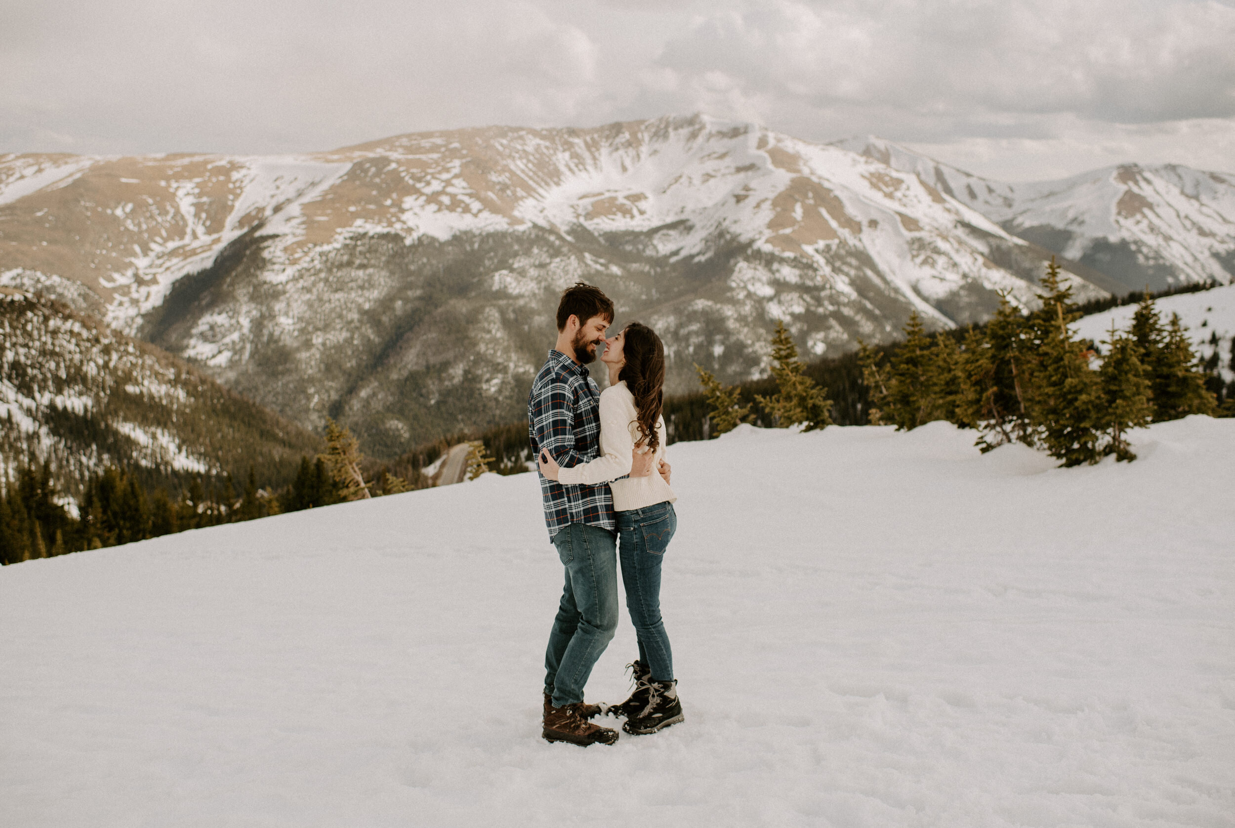  Winter Park, Colorado wedding photographer. Winter Park engagement session. Colorado adventure engagement photos. Colorado mountain engagement session. Colorado elopement photographer. Alyssa Carpenter Photo, Colorado. Snowy engagement session photos 