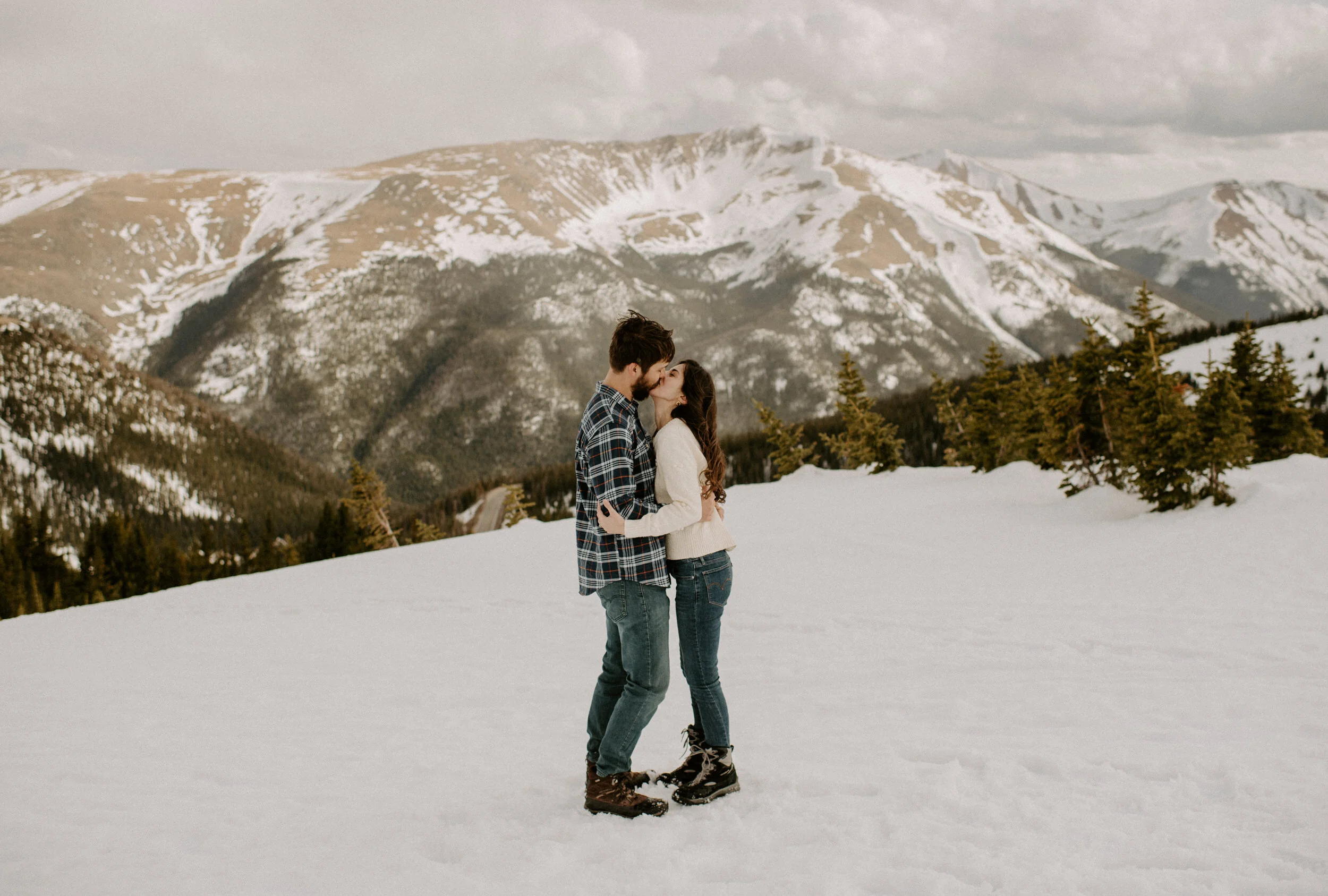  Winter Park, Colorado wedding photographer. Winter Park engagement session. Colorado adventure engagement photos. Colorado mountain engagement session. Colorado elopement photographer. Alyssa Carpenter Photo, Colorado. Snowy engagement session photos. Winter Park snowy engagement.  