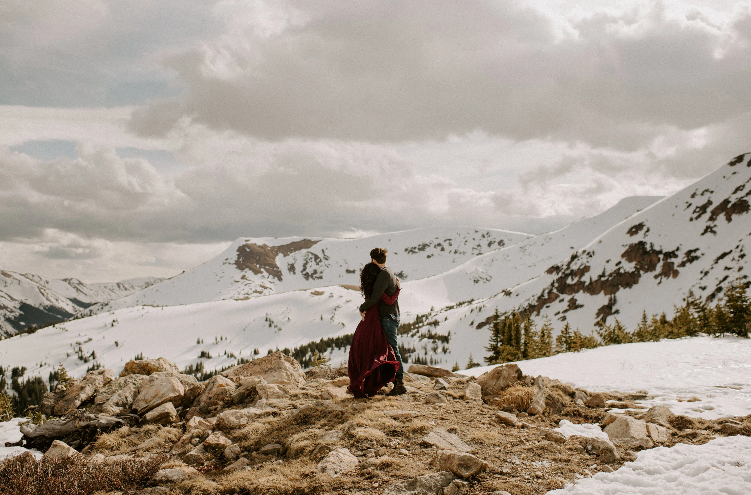  Winter Park, Colorado adventure engagement session. Winter Park wedding and elopement photographer. Colorado elopement photographer. Engagement session outfit ideas. Save the date inspiration. Snowy engagement photo ideas. 