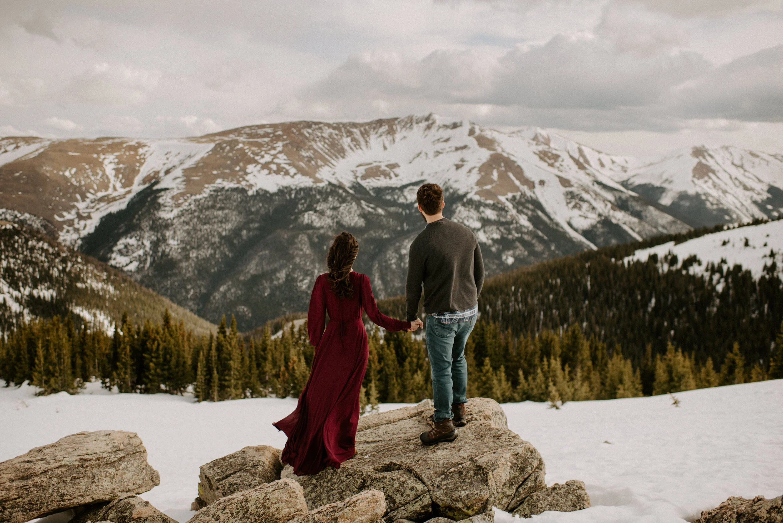  Winter Park, Colorado wedding photographer. Winter Park engagement session. Colorado adventure engagement photos. Colorado mountain engagement session. Colorado elopement photographer. Alyssa Carpenter Photo, Colorado. Snowy engagement session photos. Engagement session outfit ideas. Winter engagement session inspiration. Colorado engagement session location ideas.  