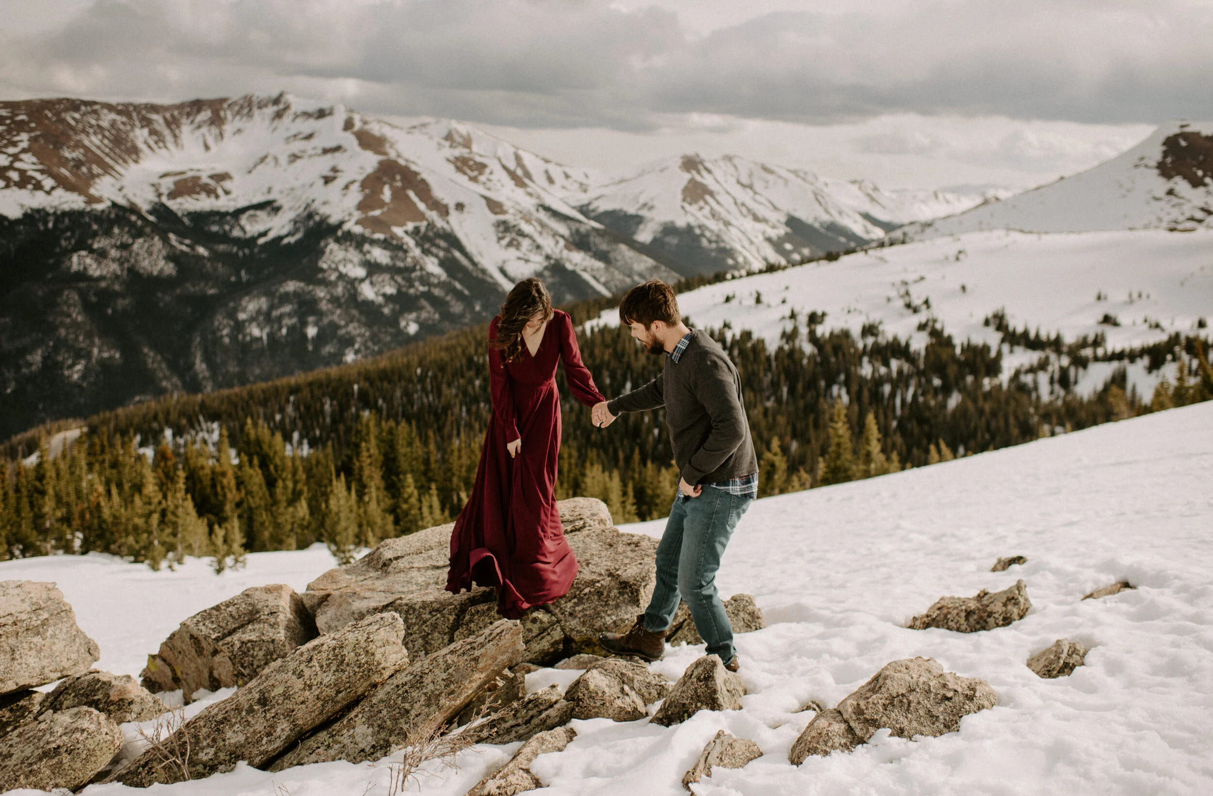  Winter Park, Colorado wedding photographer. Winter Park engagement session. Colorado adventure engagement photos. Colorado mountain engagement session. Colorado elopement photographer. Alyssa Carpenter Photo, Colorado. Snowy engagement session photos. Engagement session outfit ideas. Winter engagement session inspiration.  