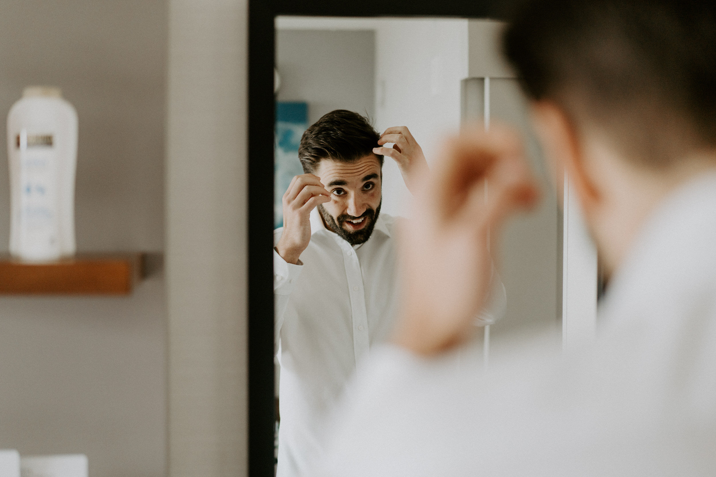  Groom getting ready before wedding at Florida Rustic Barn in Plant City, Florida. Tampa, Florida wedding venue. Florida wedding photographer. Tampa wedding photographer. Getting ready photo ideas.  