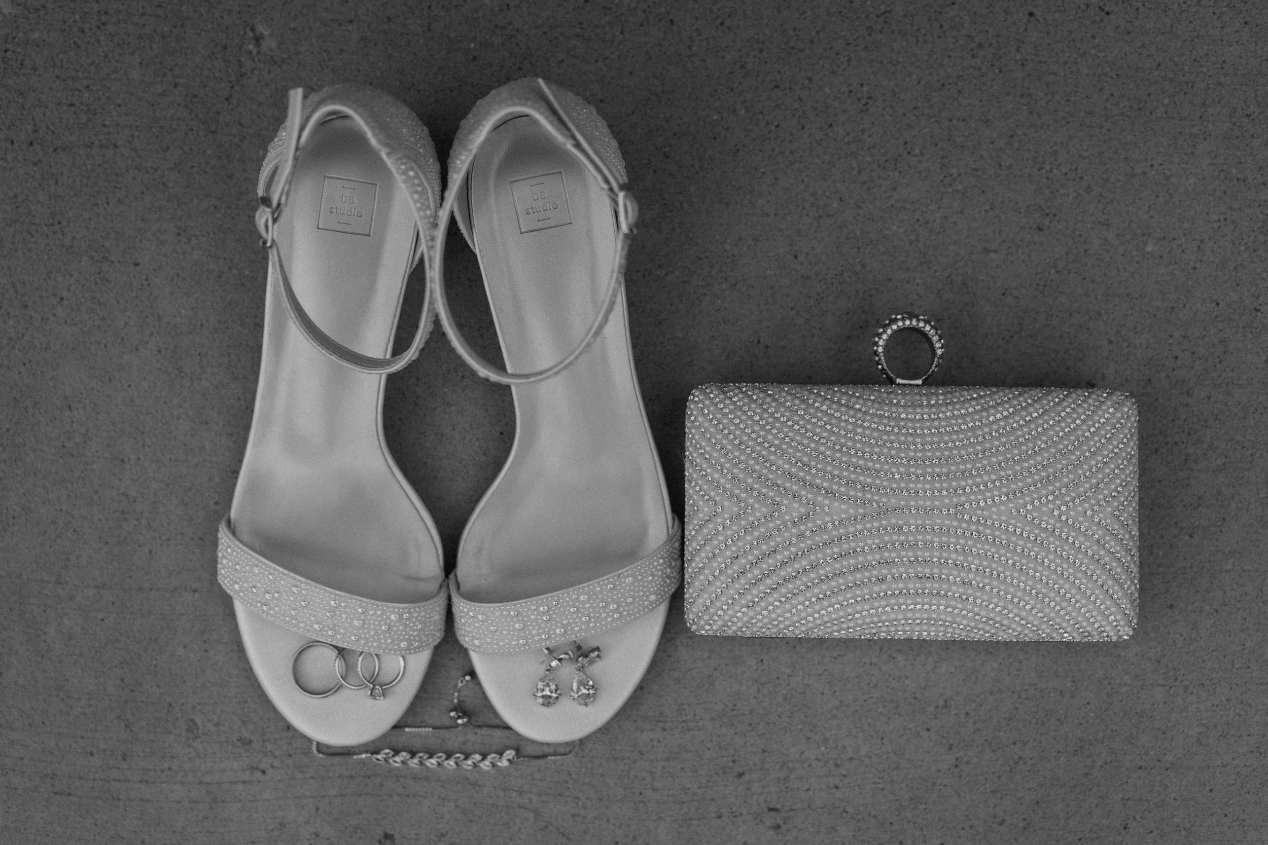 Bride's heels, earrings, bracelet, ring and clutch